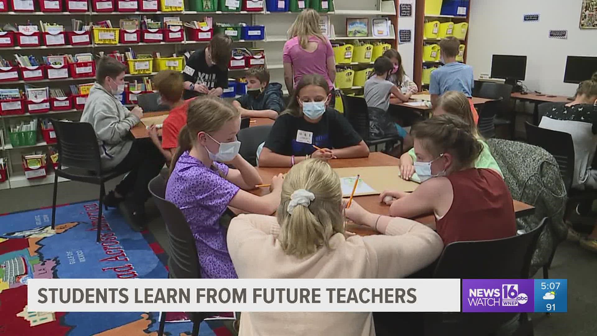 Early education majors at Bloomsburg University are teaching children at STEM camp.
