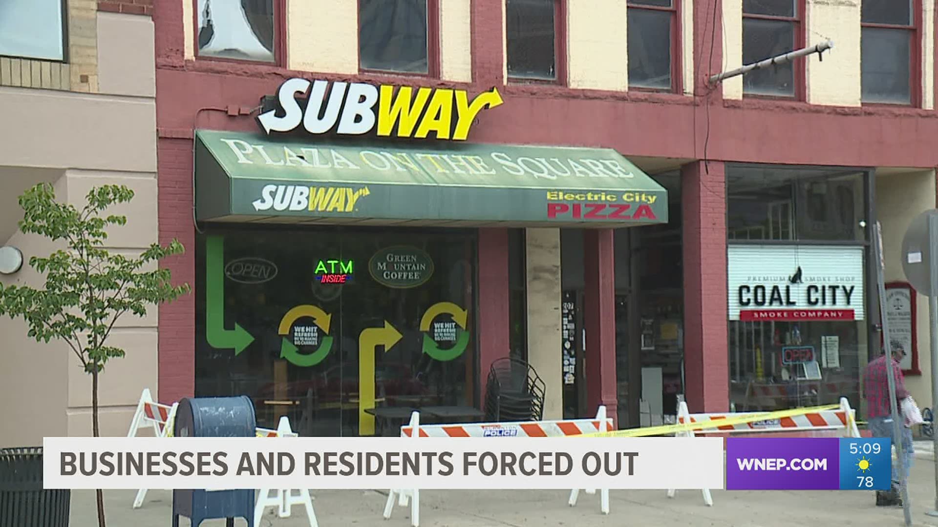 Three businesses were forced to close, and several people had to leave their homes after city inspectors say a building in Scranton is unsafe.