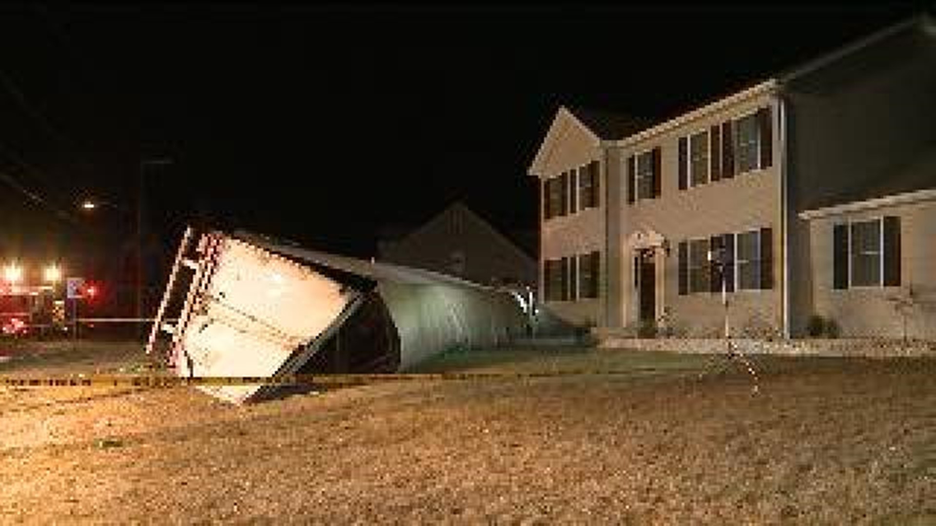 Big Rig Flips, Comes Within Feet of Sleeping Family’s Home
