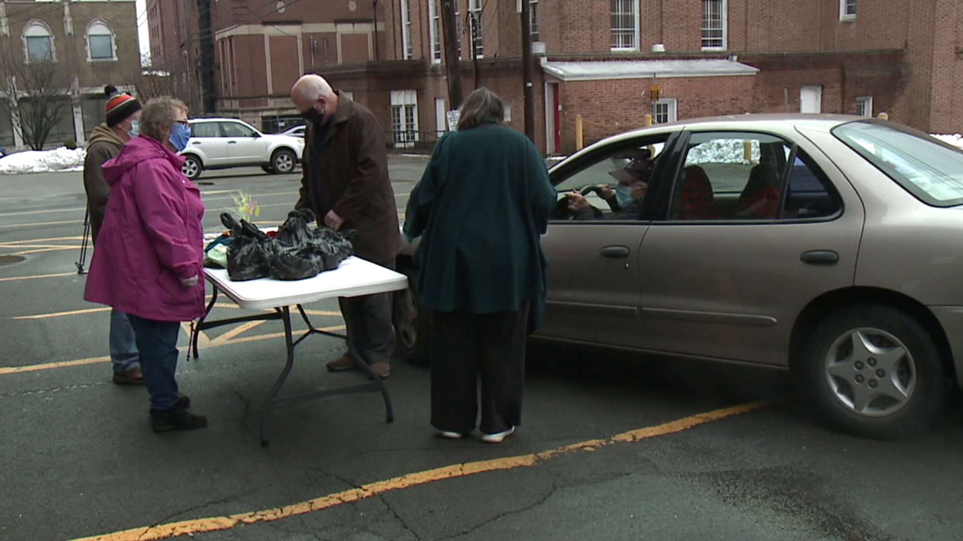 The collaborative effort between churches distributes free meals once a month.