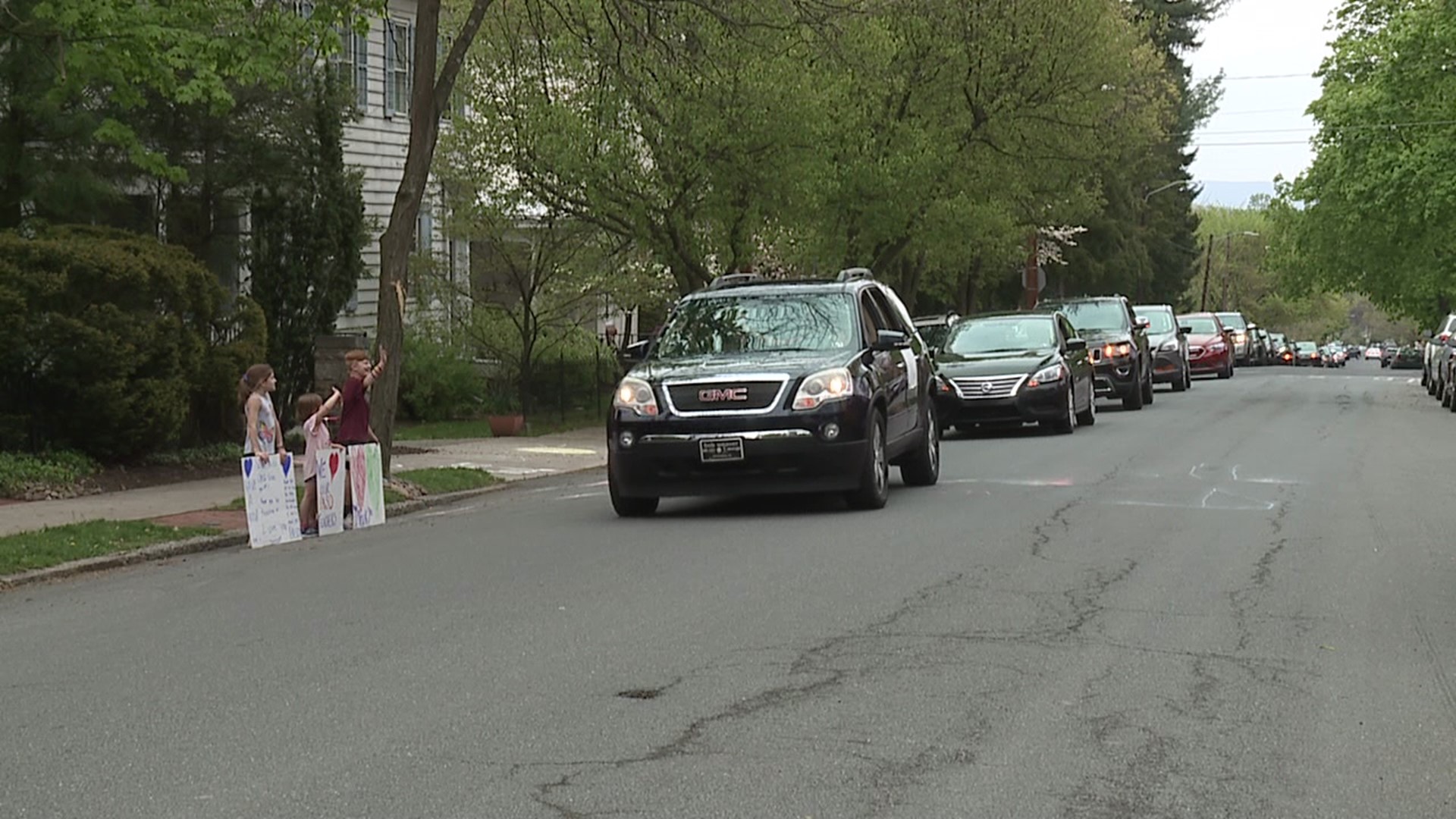 A motorcade through the city aimed to show solidarity in the face of budget cuts.