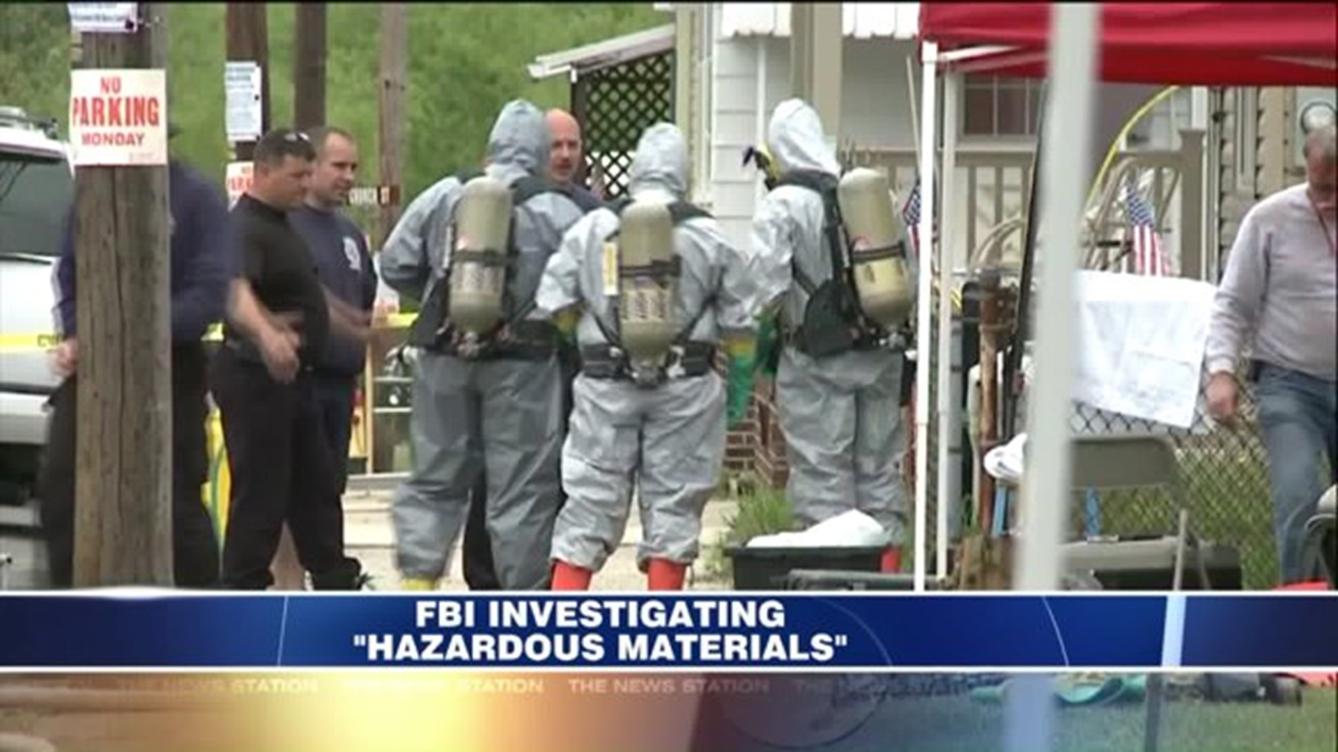 Crews Removing Hazardous Materials from Home