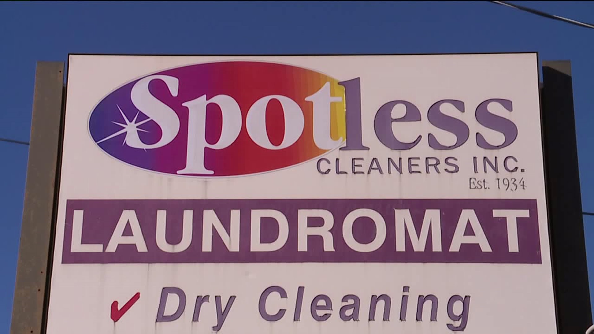Spotless Dry cleaners employees donate to Rotary Splash Park