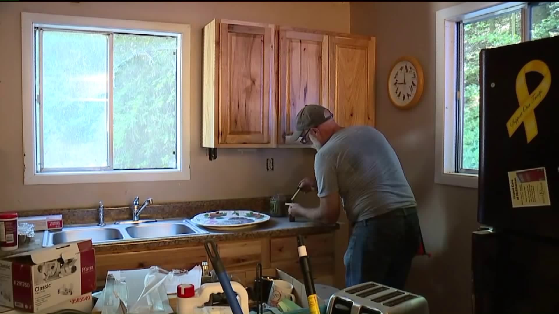 Volunteers Rebuild Veteran's Home