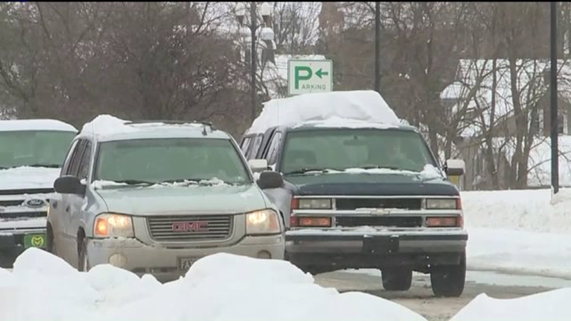 Snow-Covered Vehicles Cause Problems