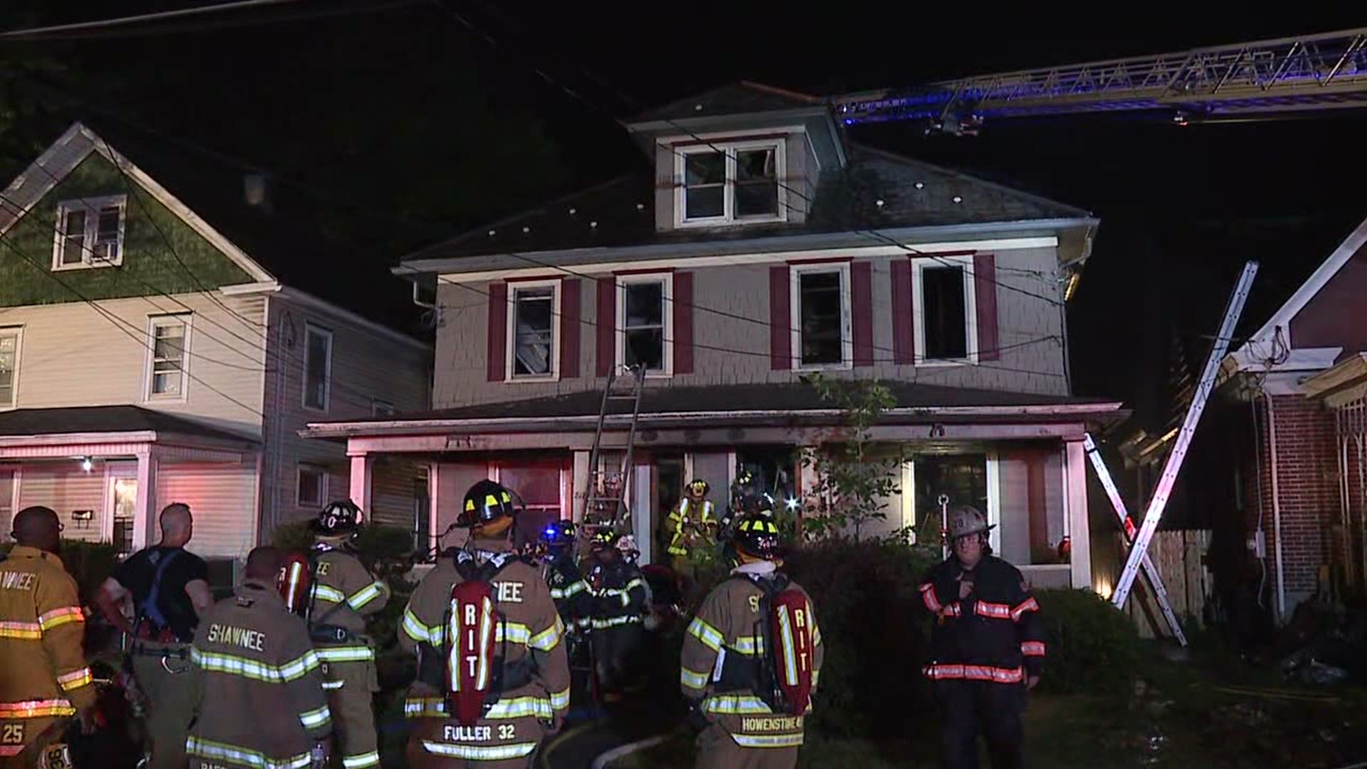 Firefighters were able to rescue two people who crawled out onto the roof.