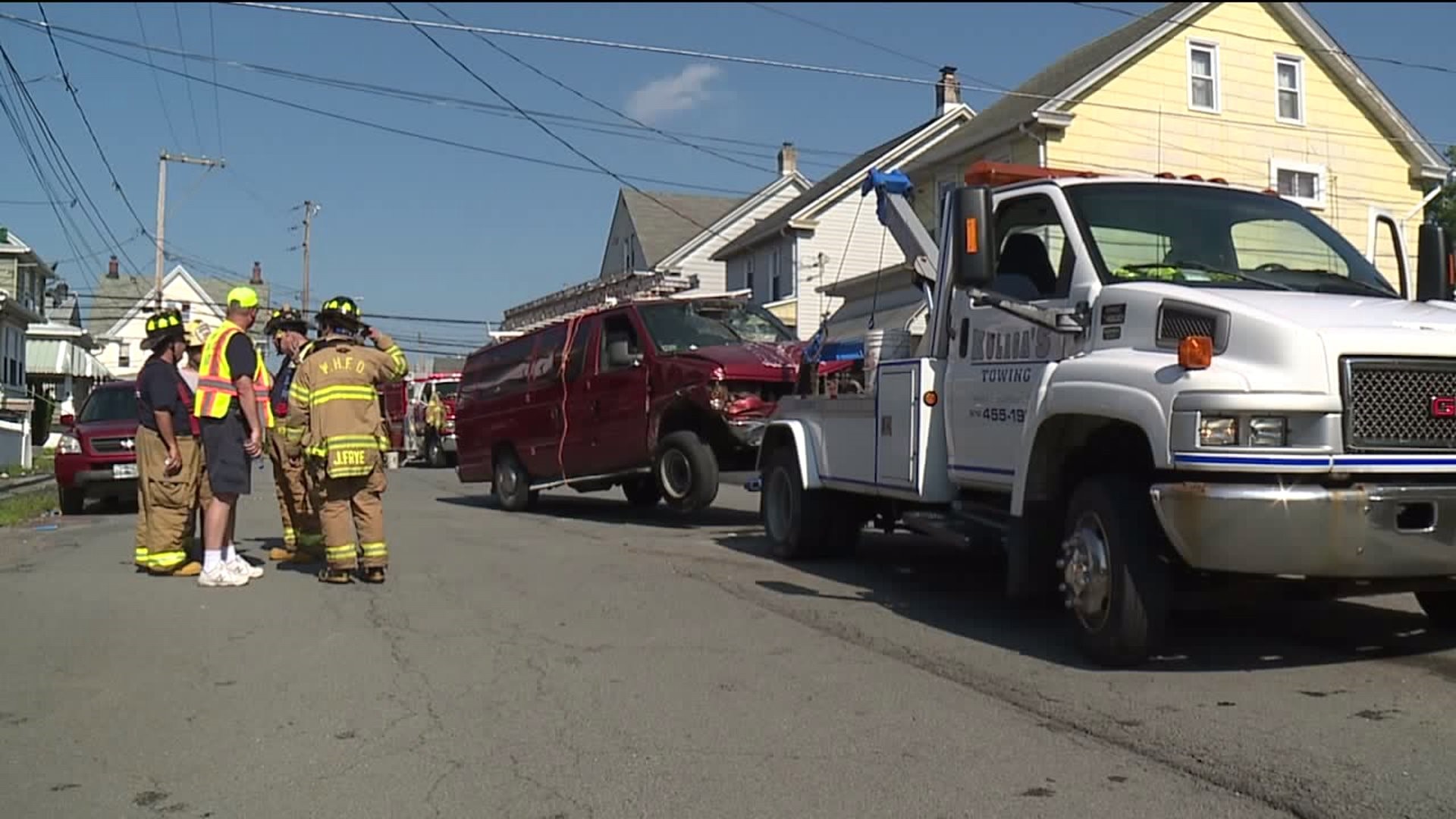 Car Strikes Van Forcing Crash Into Garage