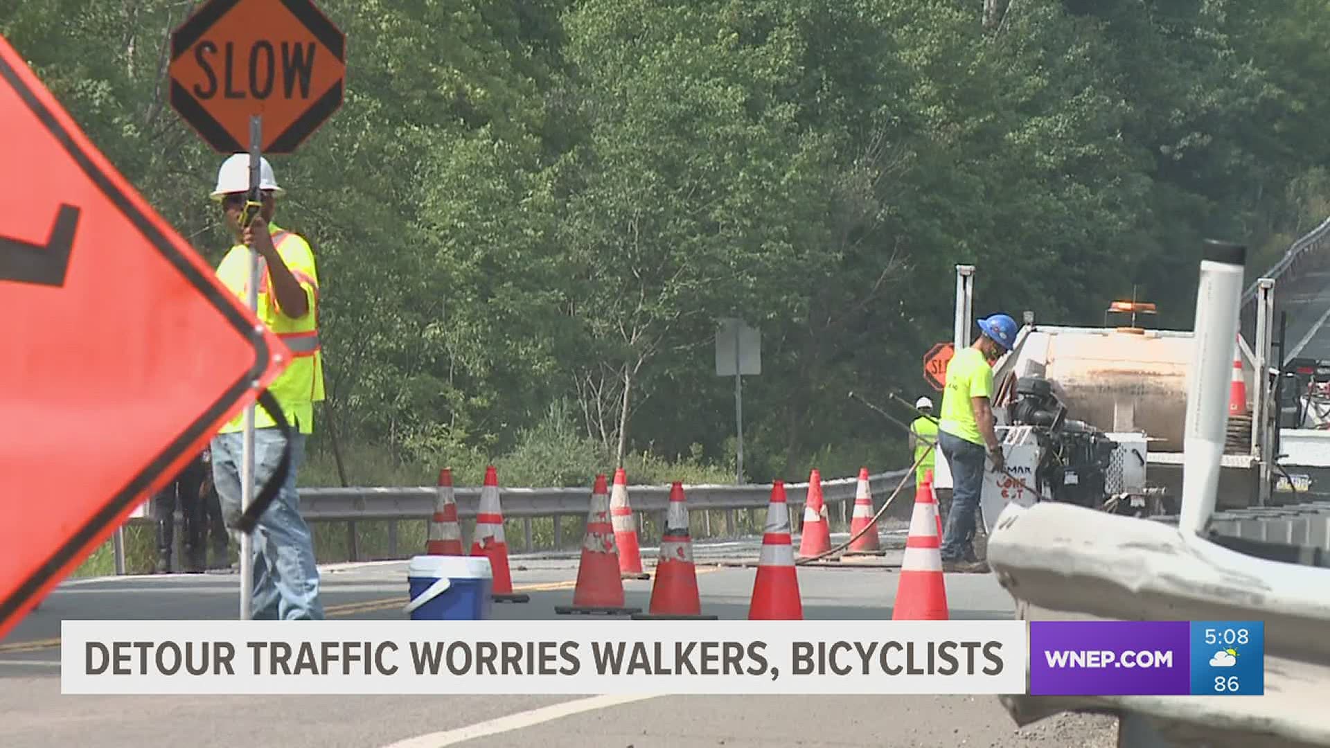 As PennDOT works underneath Route 118 in Lehman Township, walkers on the detour route are on alert for heavier traffic.