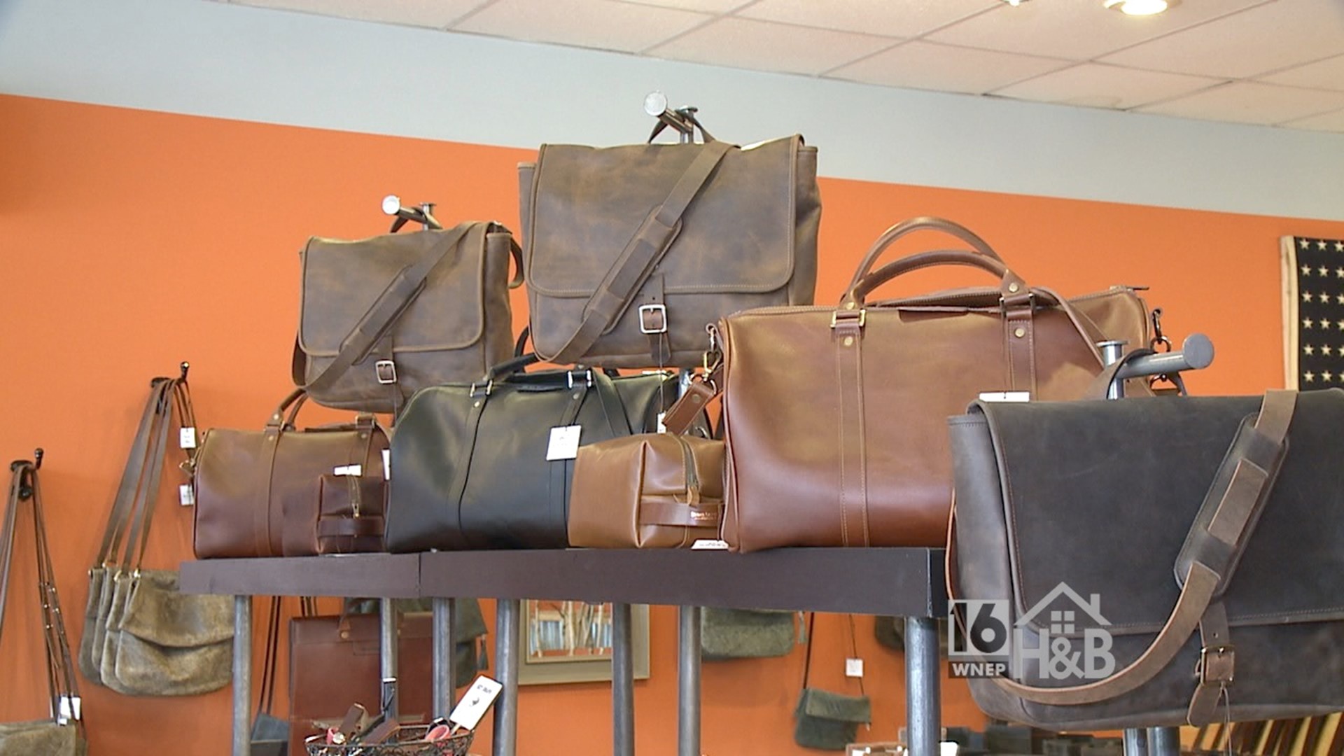 Leather artisans create one of a kind hand bags.