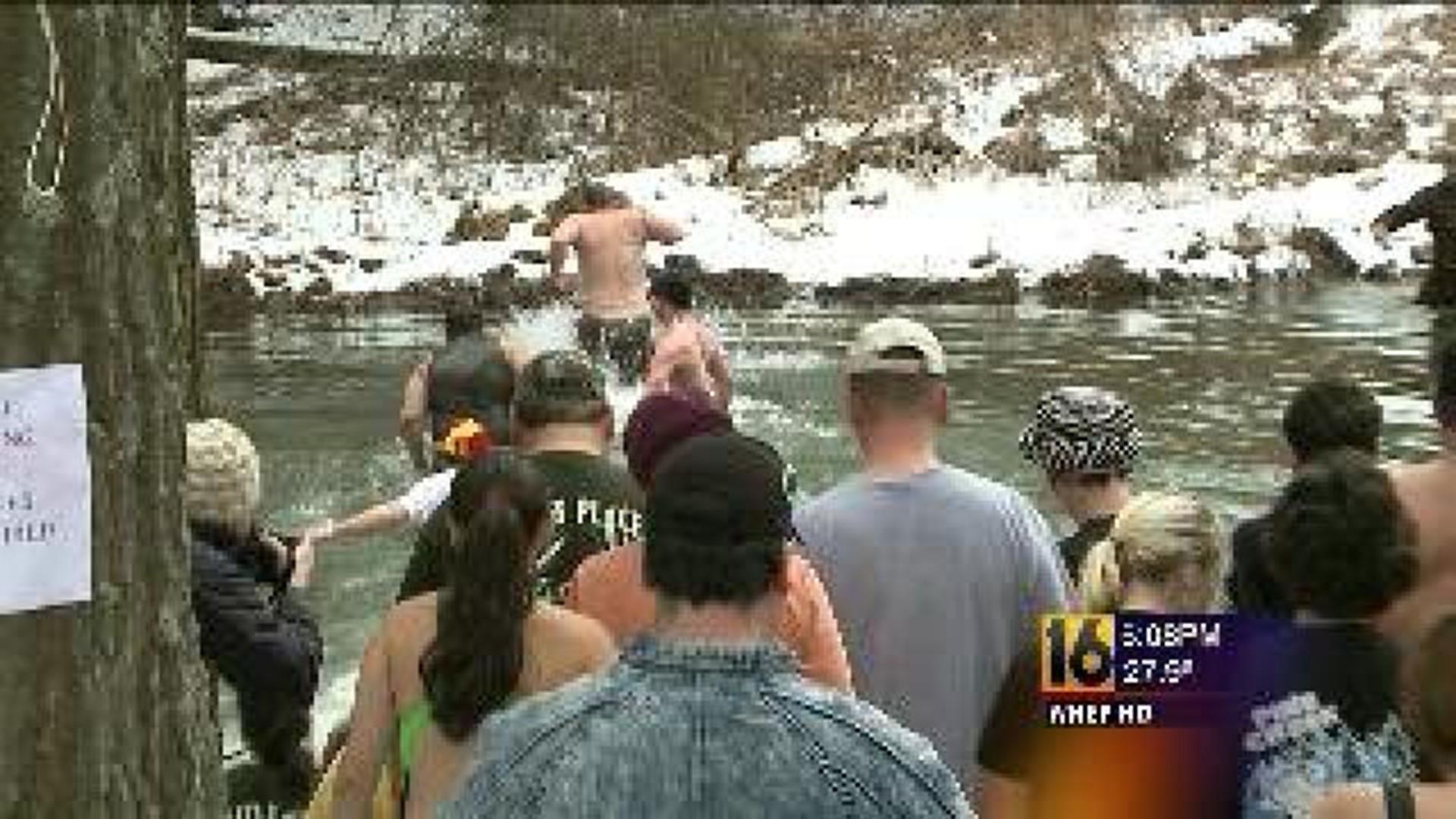 Dozens Take Icy Plunge For Good Cause