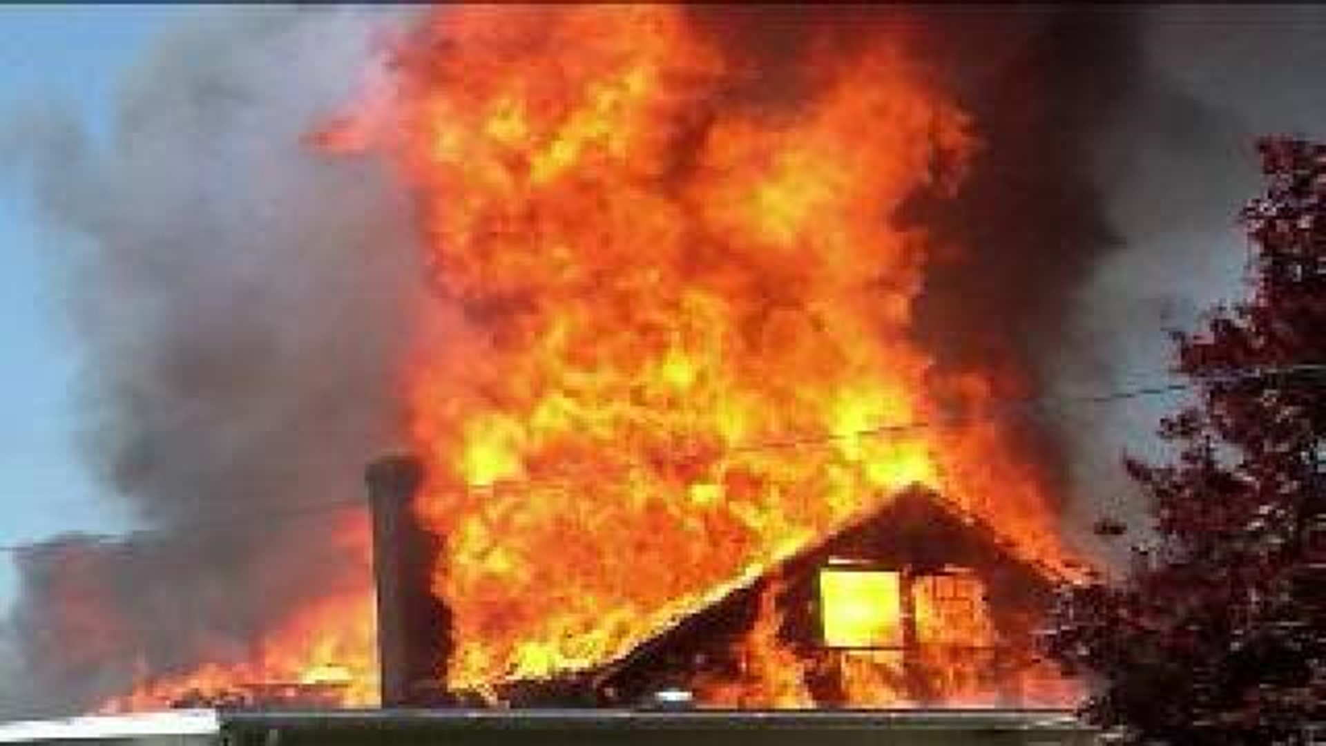 Flames Rip Pine Grove Building