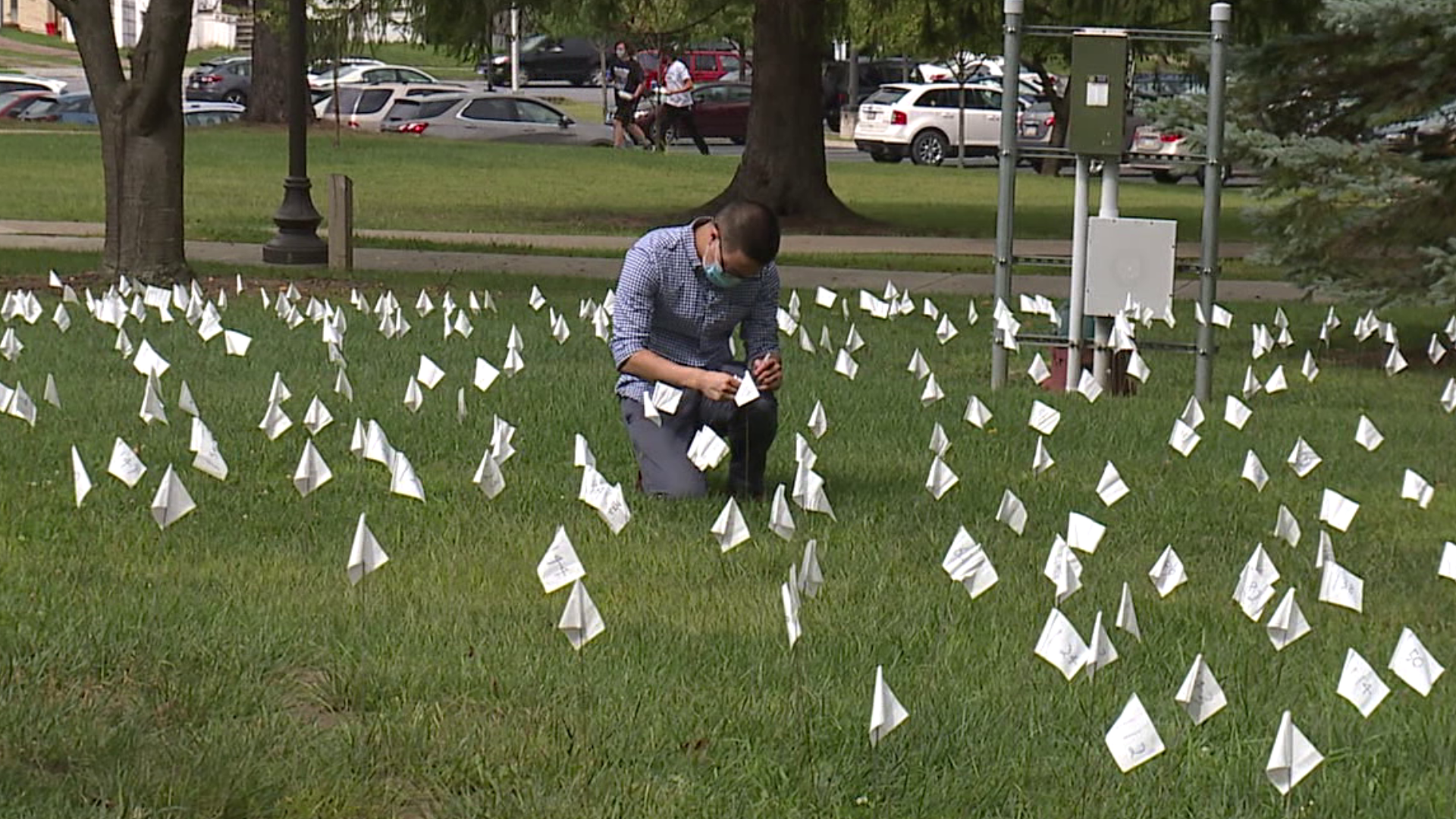 The Field of Memories on Marywood's campus displays white flags to recognize the average number of U.S. college students who commit suicide each year.