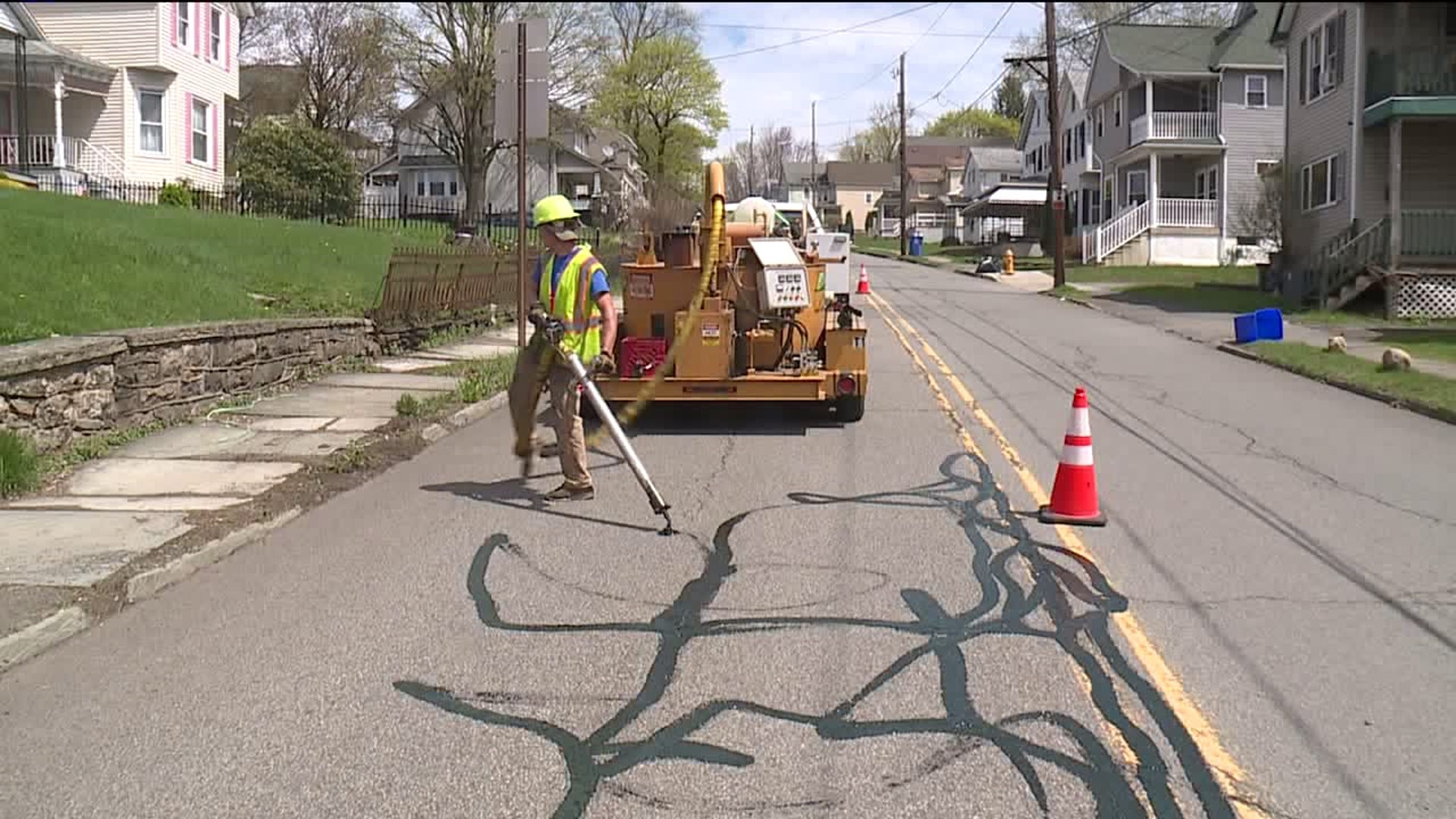 Road Crews Sealing Cracks to Prevent Potholes