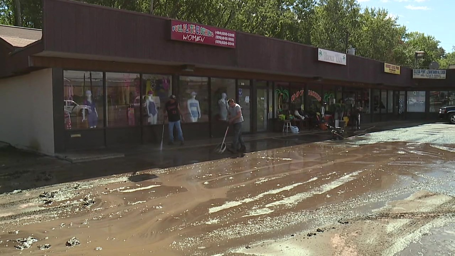 Shops along the Sans Souci Parkway in Hanover Township are a muddy mess after heavy rain from Ida forced Solomon Creek over its banks and into the businesses.