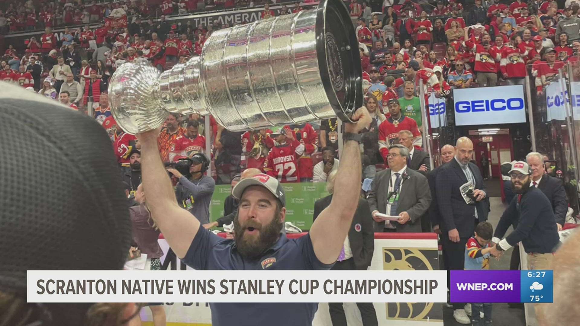 Mike Joyce, Florida Panthers head strength and conditioning coach, hoists Stanley Cup after Game 7 win