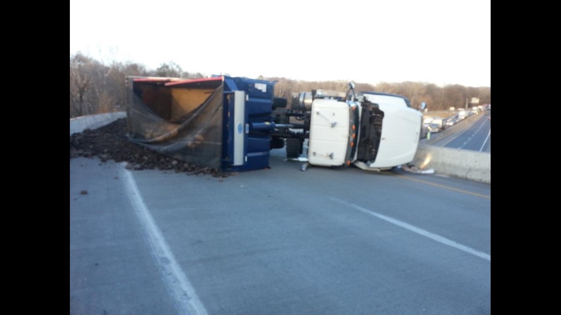 Dump Truck Rolls onto Side, Spilling Debris | wnep.com