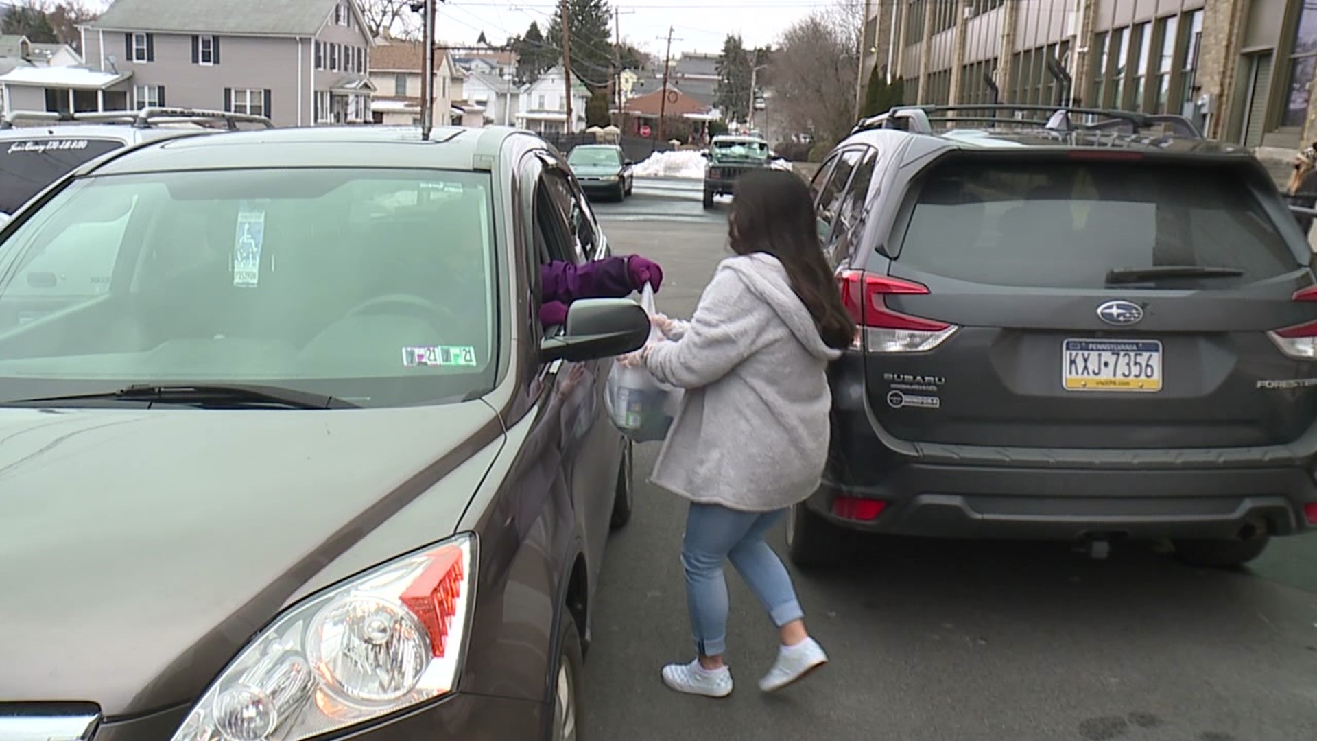 A group of high school students eager to work together in person on a school project decided to help out those hit hard by the pandemic.