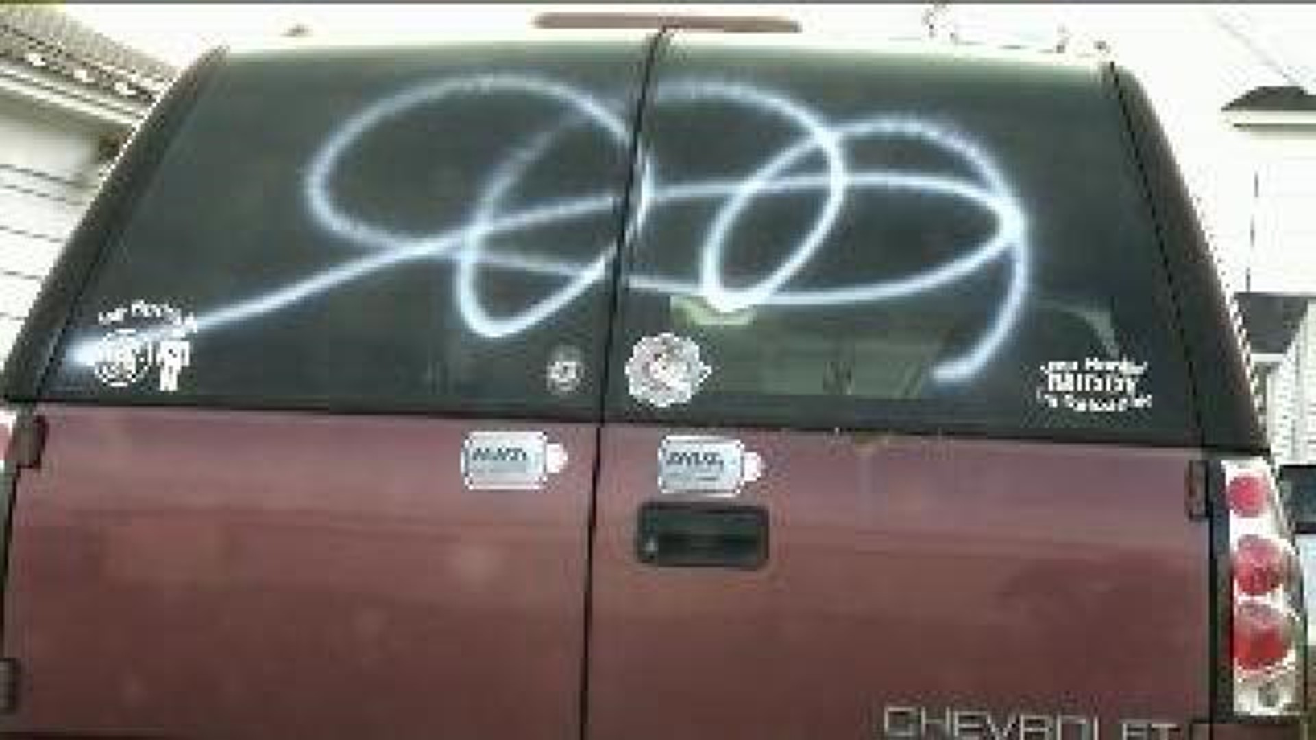 Vandals Deface Car and Garage
