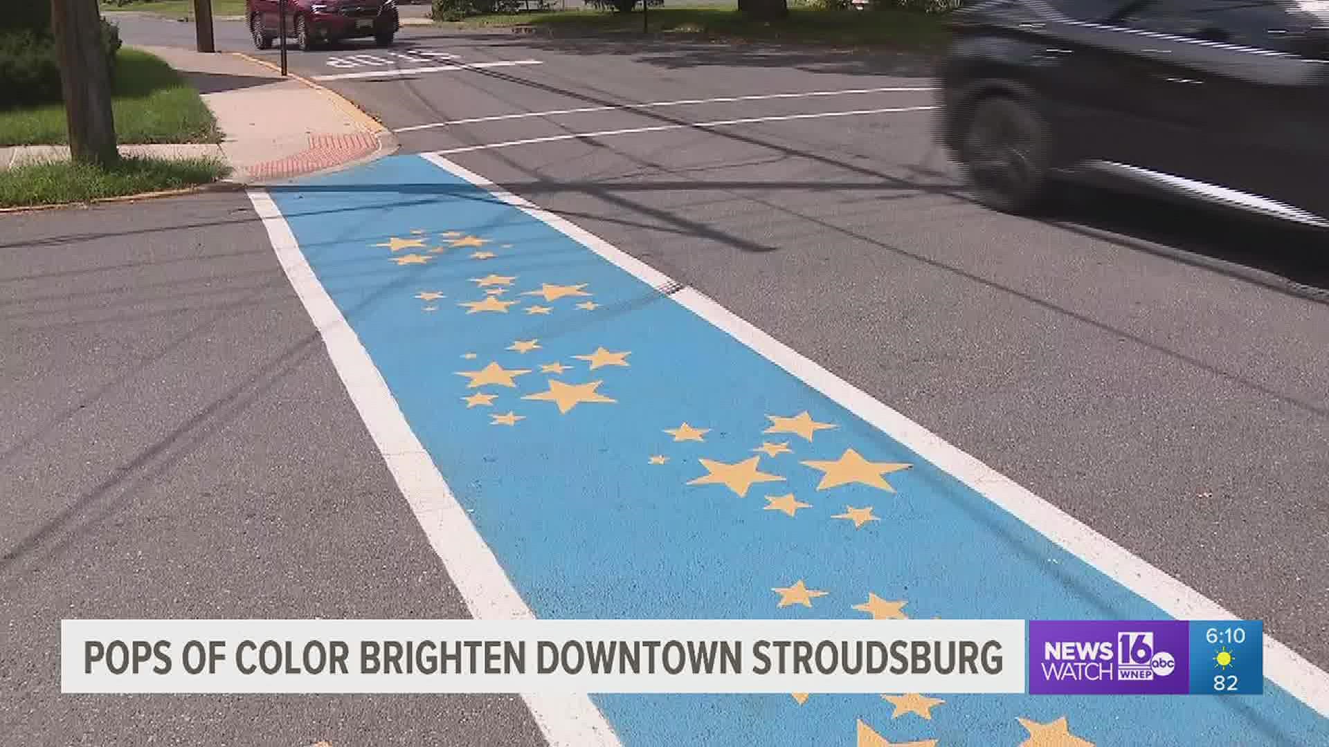 If you've taken a stroll around downtown Stroudsburg lately, you might notice pops of color at different crosswalks.