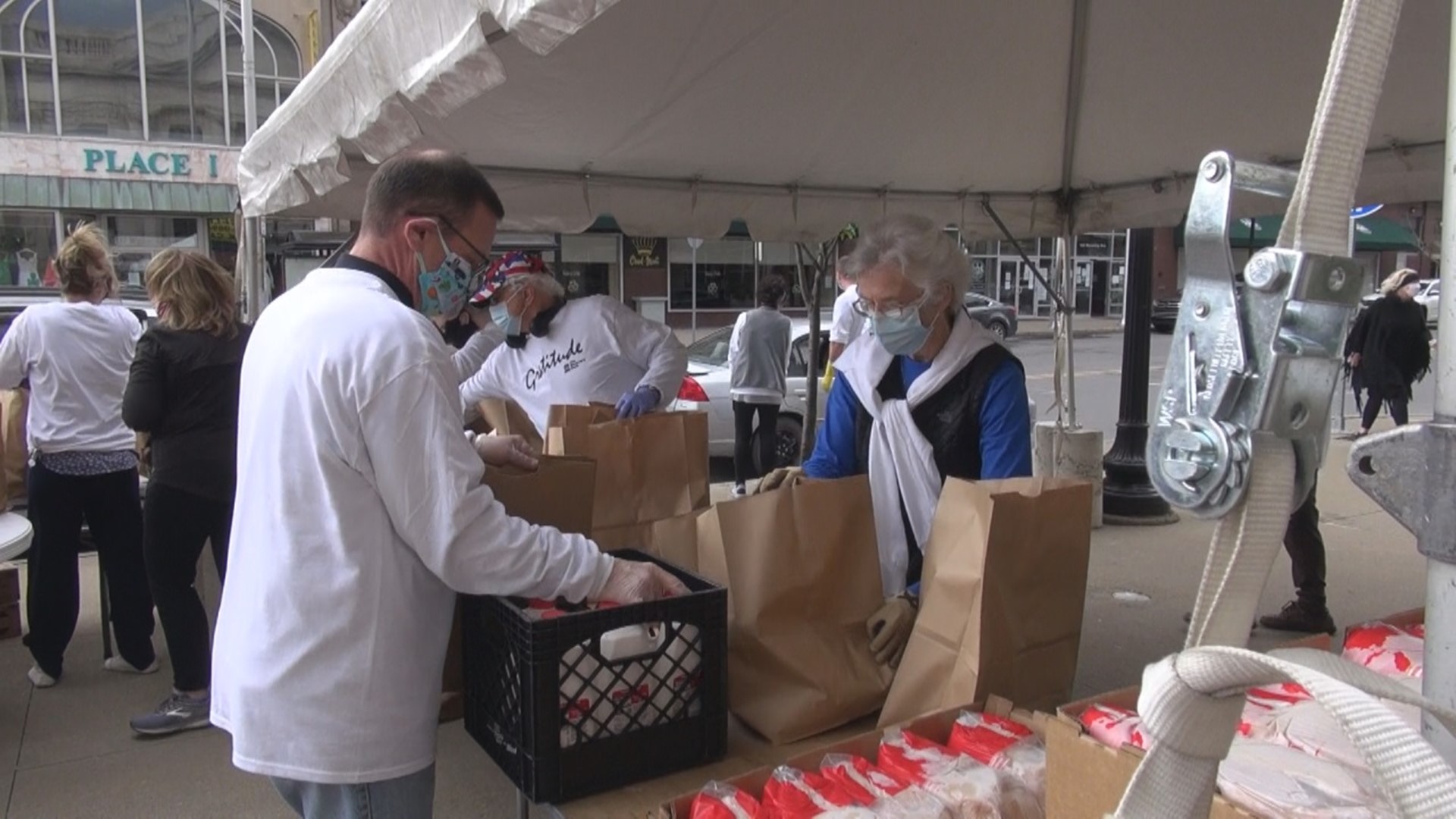 Volunteers distributed groceries to those impacted by the economic downturn.