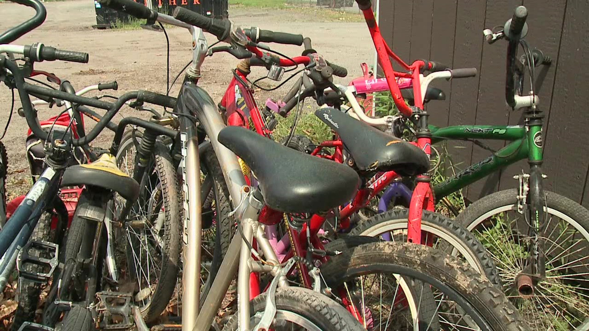 Some unwanted bikes are now in the hands of a nonprofit organization that will use them to give back to children, but you'll have to earn those wheels.