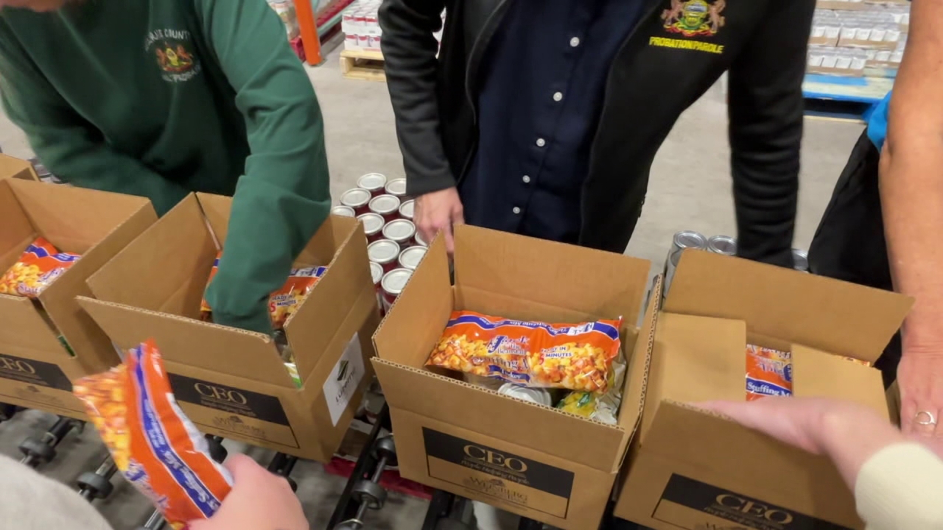 CEO Weinberg volunteers tackle rising costs to feed thousands this Thanksgiving