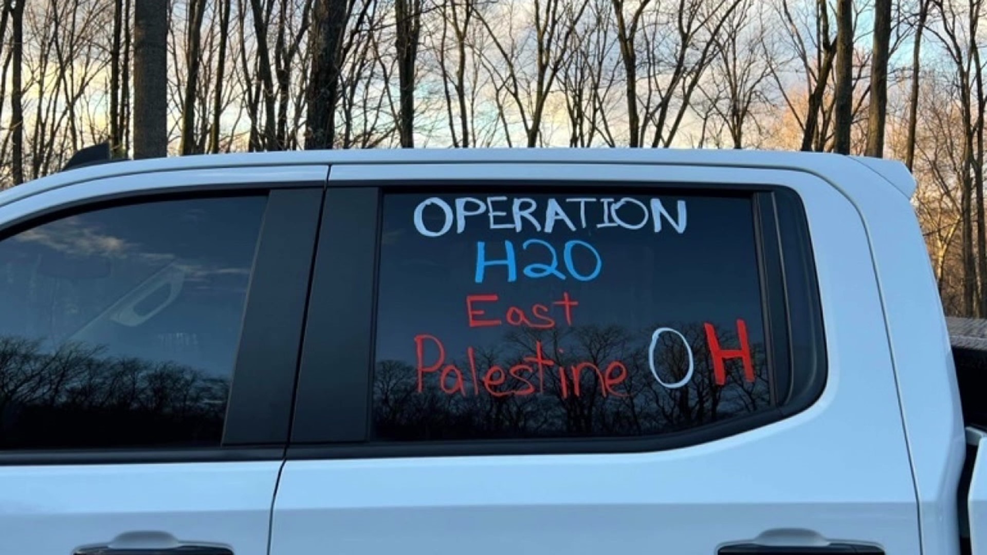 The two men are in Ohio, bringing 400 cases of bottled water to residents living near the train derailment site. Most of the water was donated.