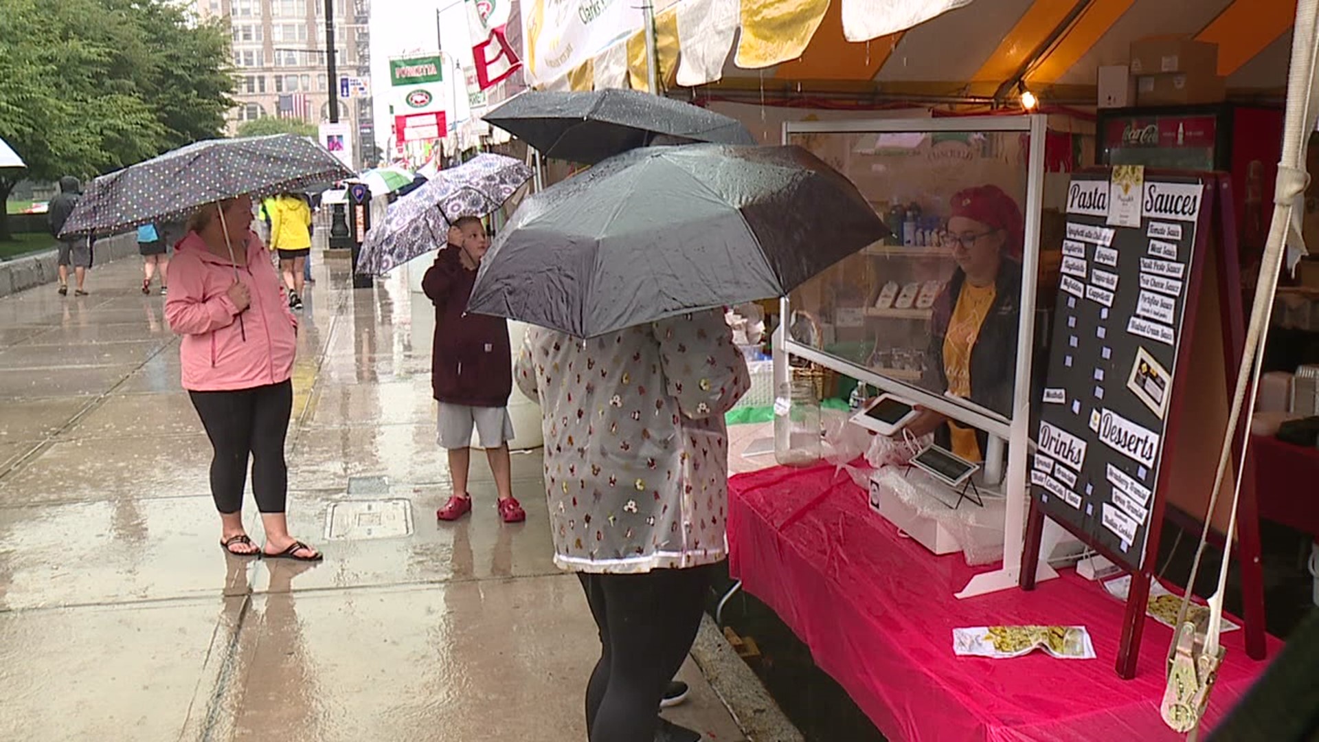 Newswatch 16's Courtney Harrison shows us how the rain may have kept away some vendors, but it didn't scare away some hungry folks.