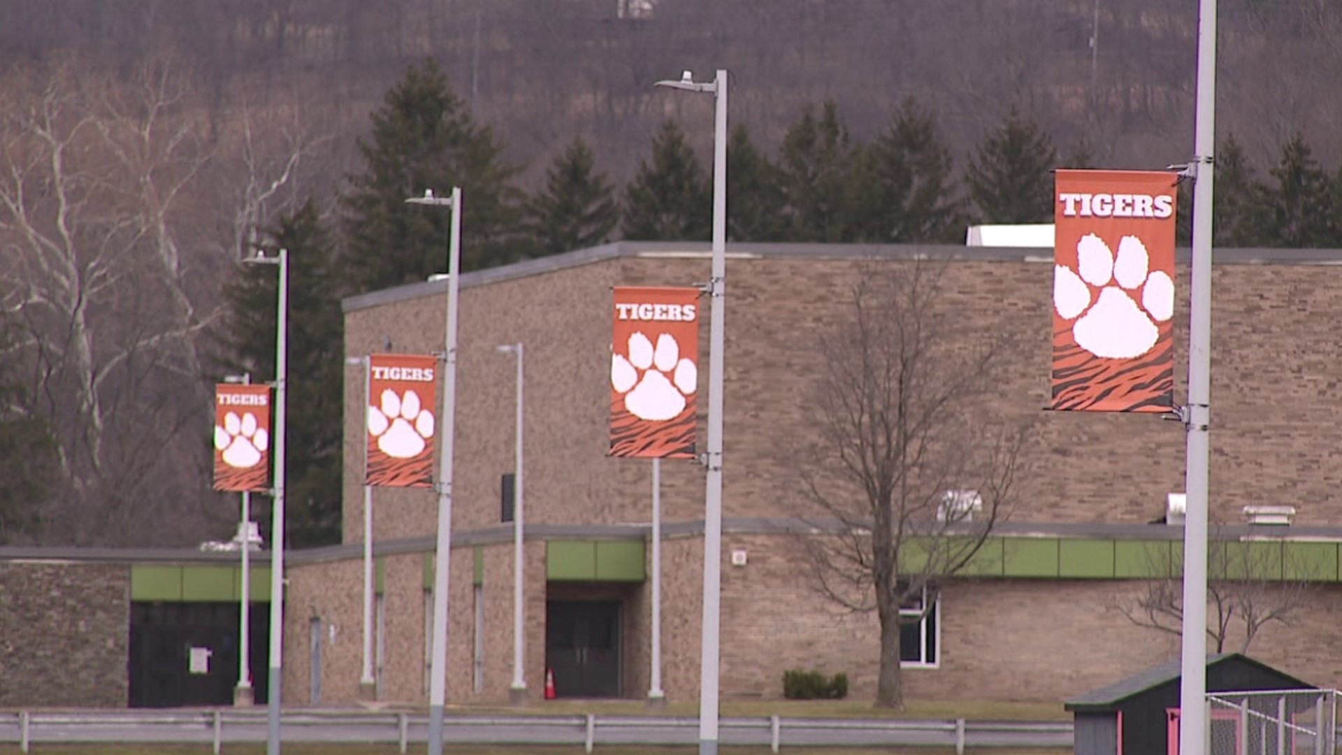 A former gym teacher from Wyoming County again faces charges of having inappropriate contact with students.