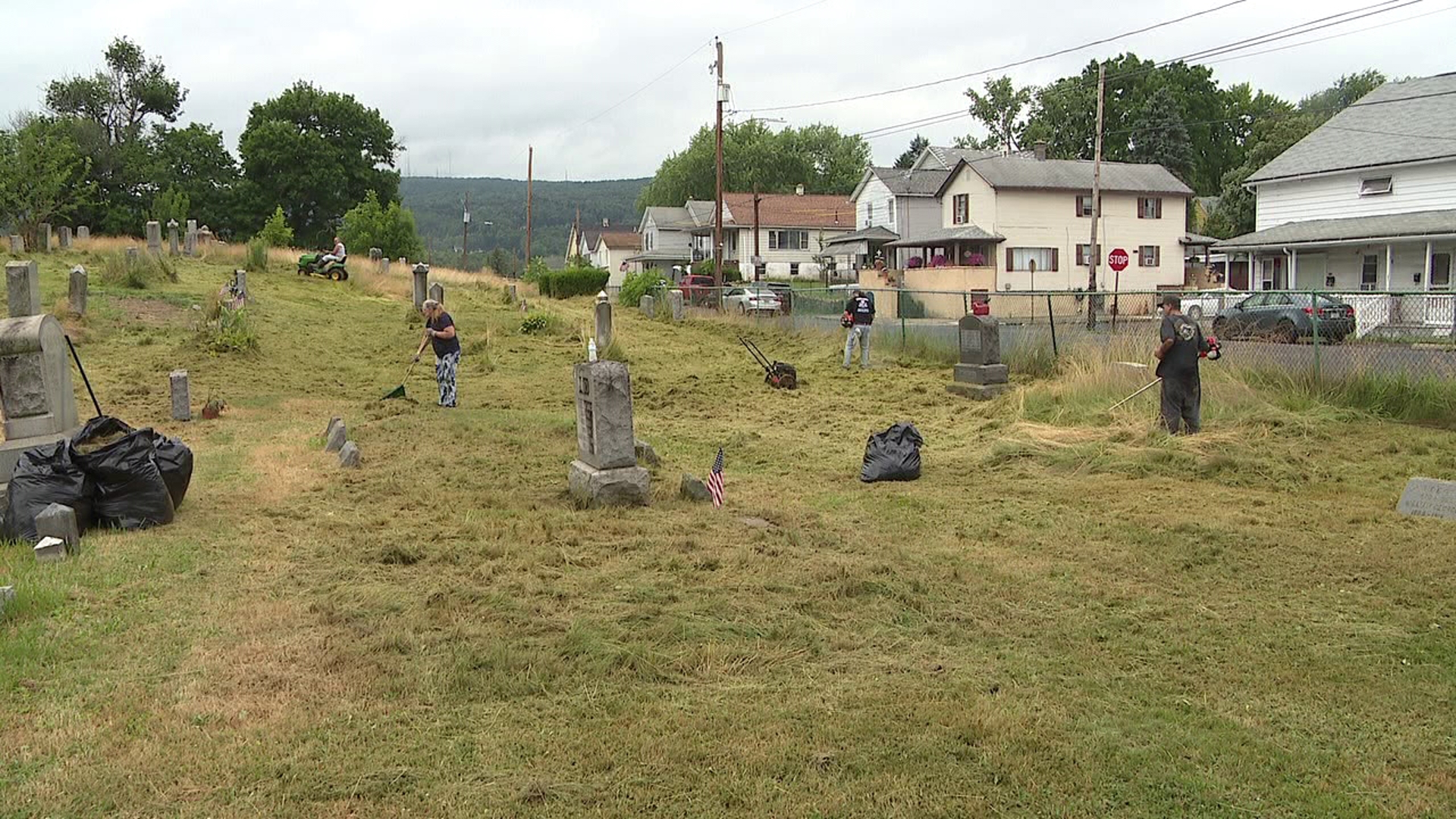 Weeds and grass have taken over a cemetery in Scranton, but a local non-profit, along with some volunteers, hopes to change that.