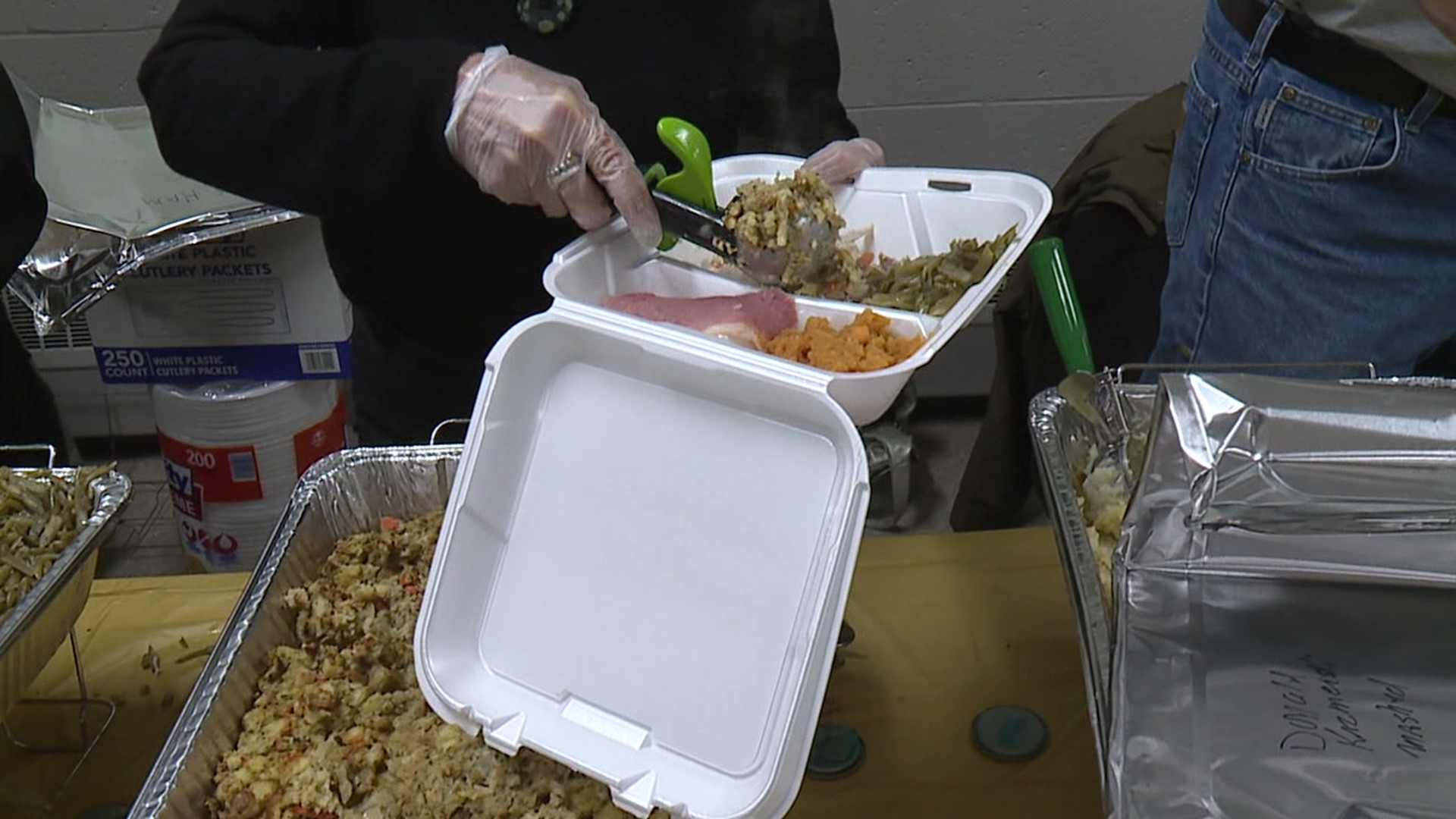 Volunteers in Dickson City are spending part of their Thanksgiving holiday serving a free meal.