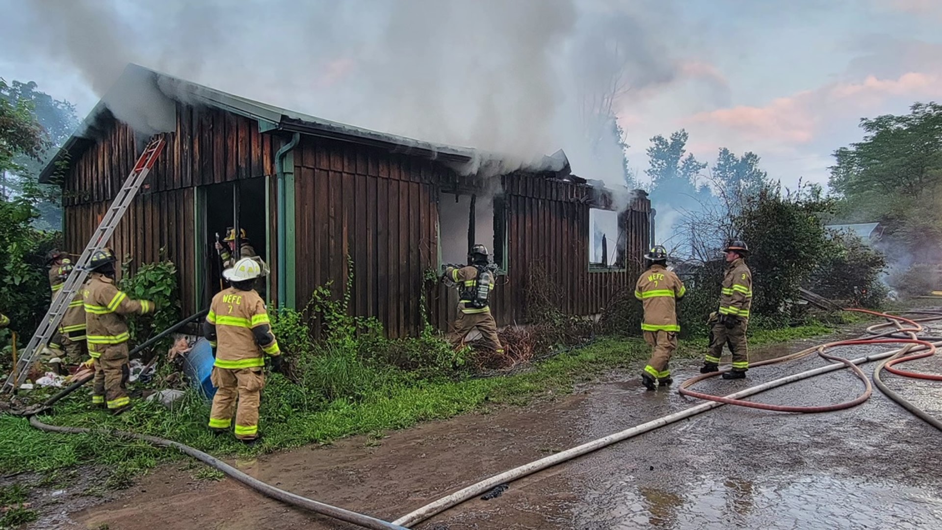 Crews say ammunition was going off inside the place, and they had to deal with a large wasp nest.