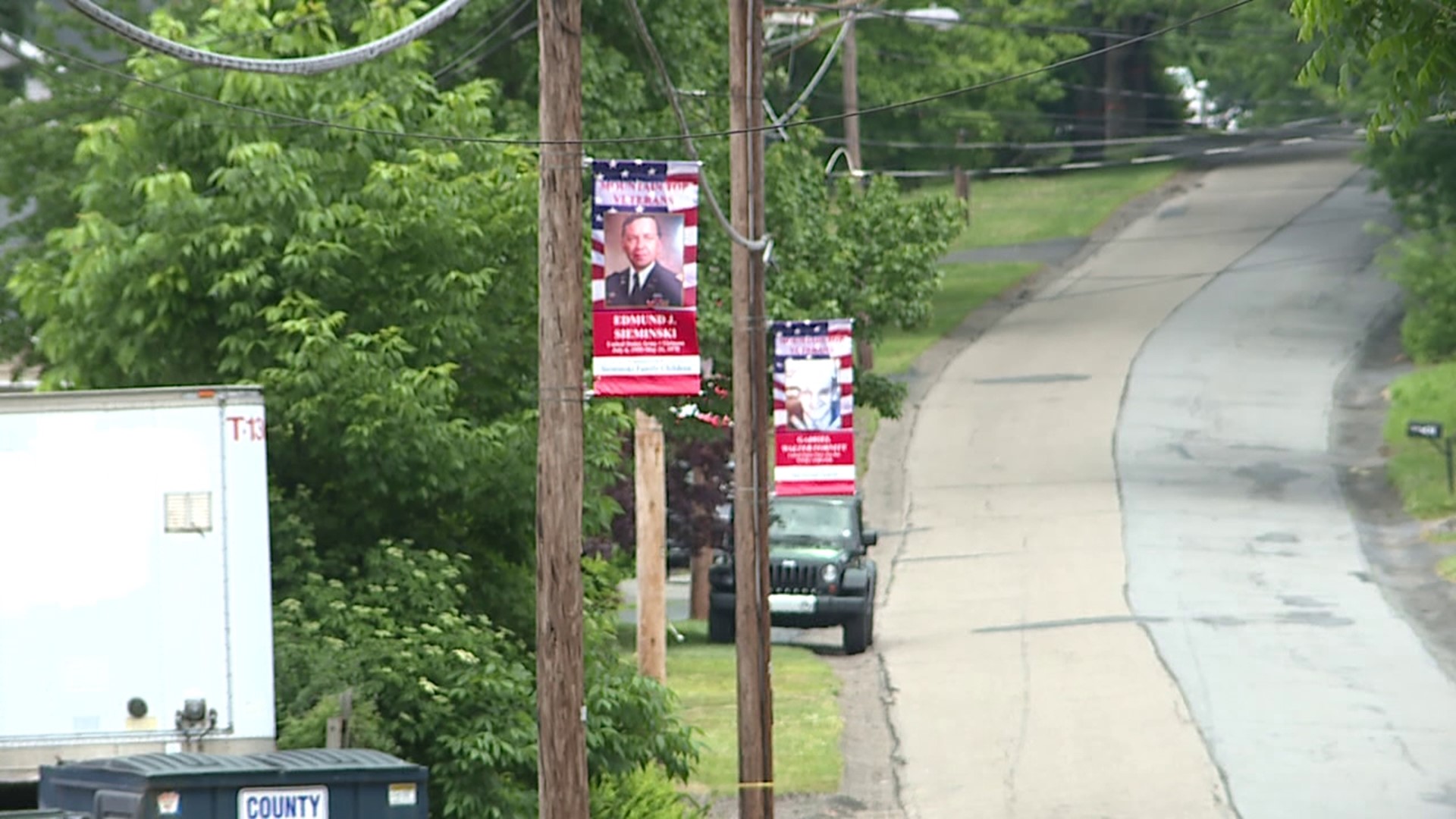 The Hometown Heroes program began hanging banners on Sunday recognizing veterans from Mountain Top.