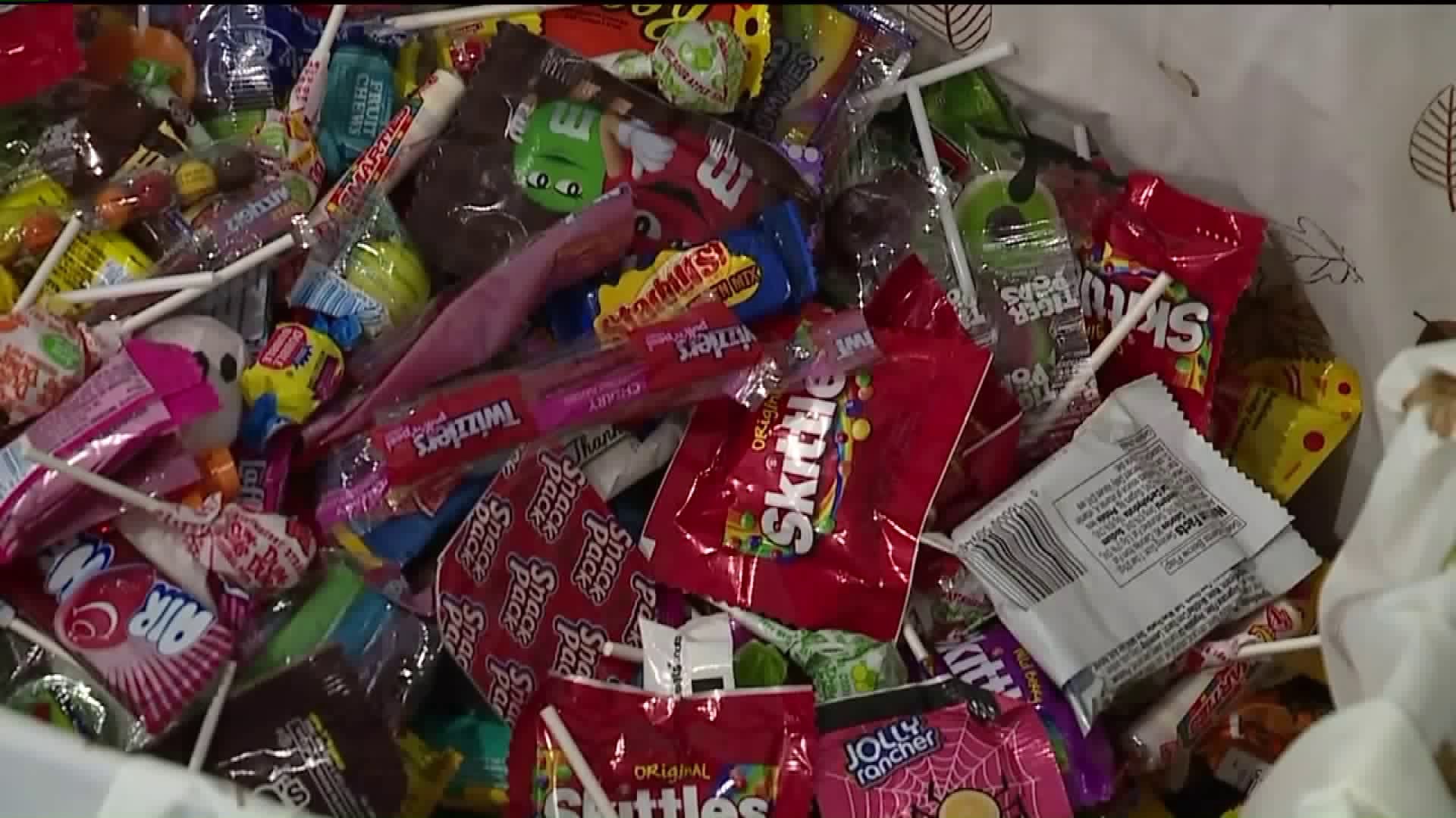 Dentist Buying Halloween Candy for Troops