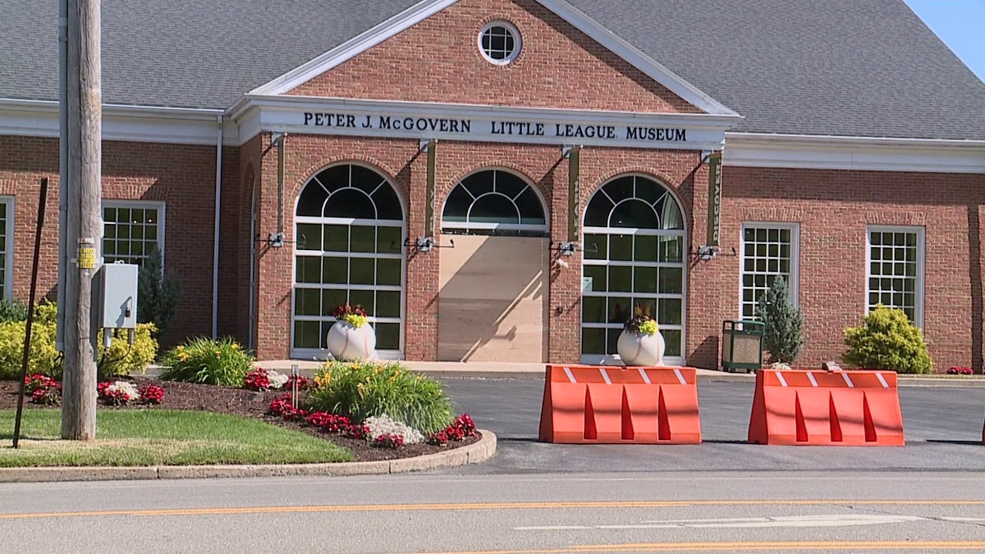 A woman is locked up in Lycoming County, accused of trying to destroy the World of Little League Museum Sunday afternoon.