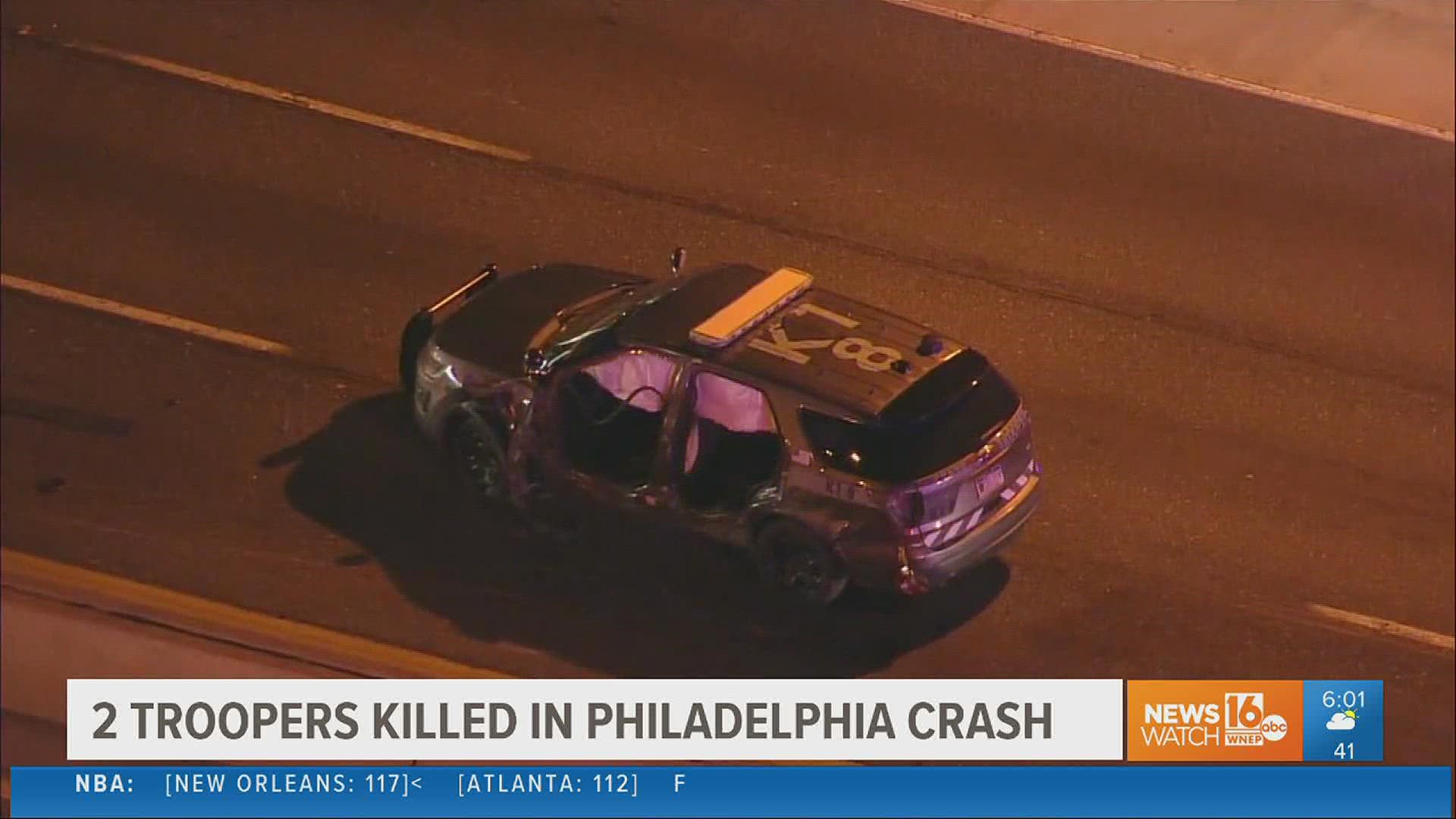 Two Pennsylvania state troopers and a third person were hit and killed during a traffic stop in Philadelphia.