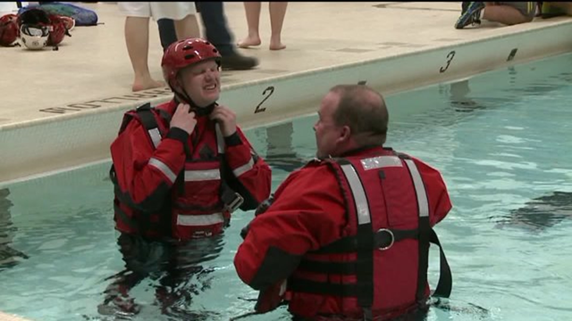 Water Rescue Team Practices With New Suits