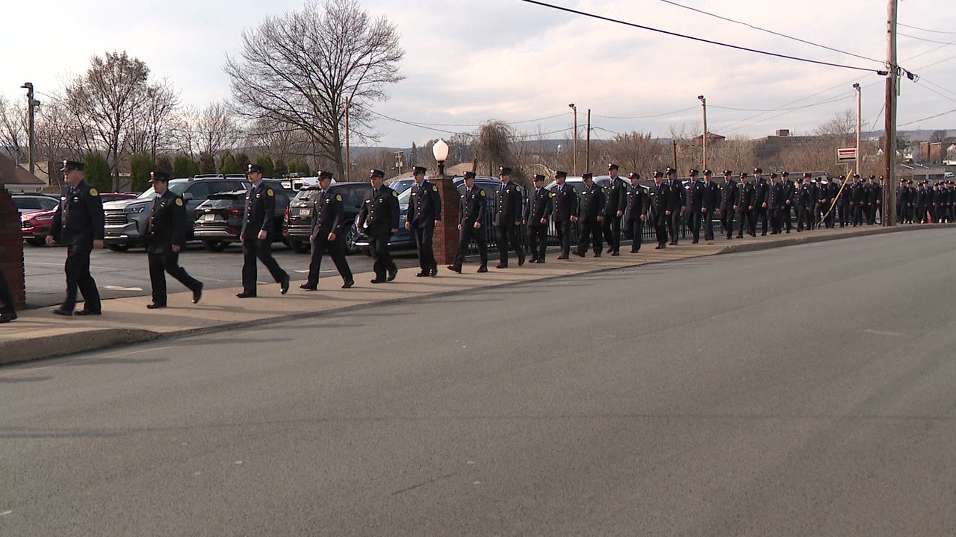 Friends, family, and fellow firefighters paying their respects at a viewing Thursday afternoon at the Chomko Funeral Home for Lieutenant Kelly "Hoppy" Hopkins.