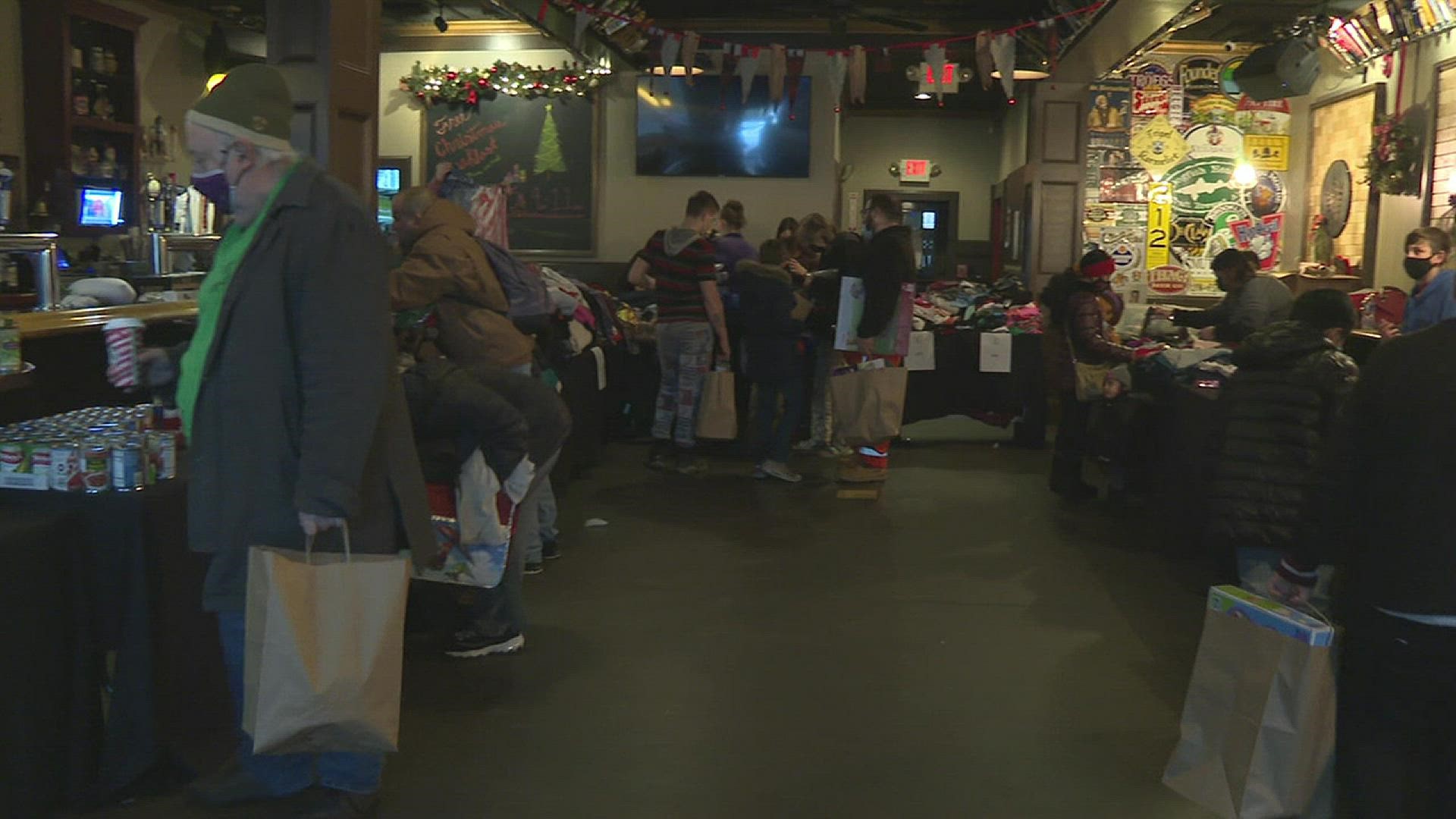 Dozens of people who stopped in could pick out toys, clothing, household items and grab breakfast this Christmas.