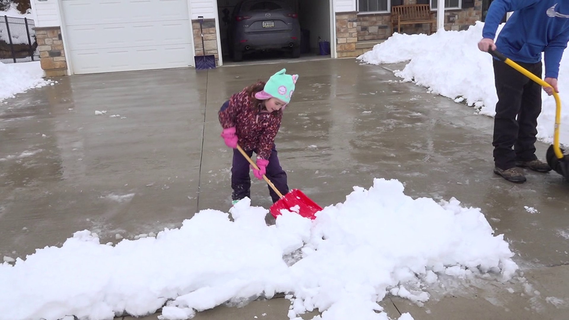 After 13 inches of snow fell in Carbon County, it was a day full of work for some and a day full of play for others.