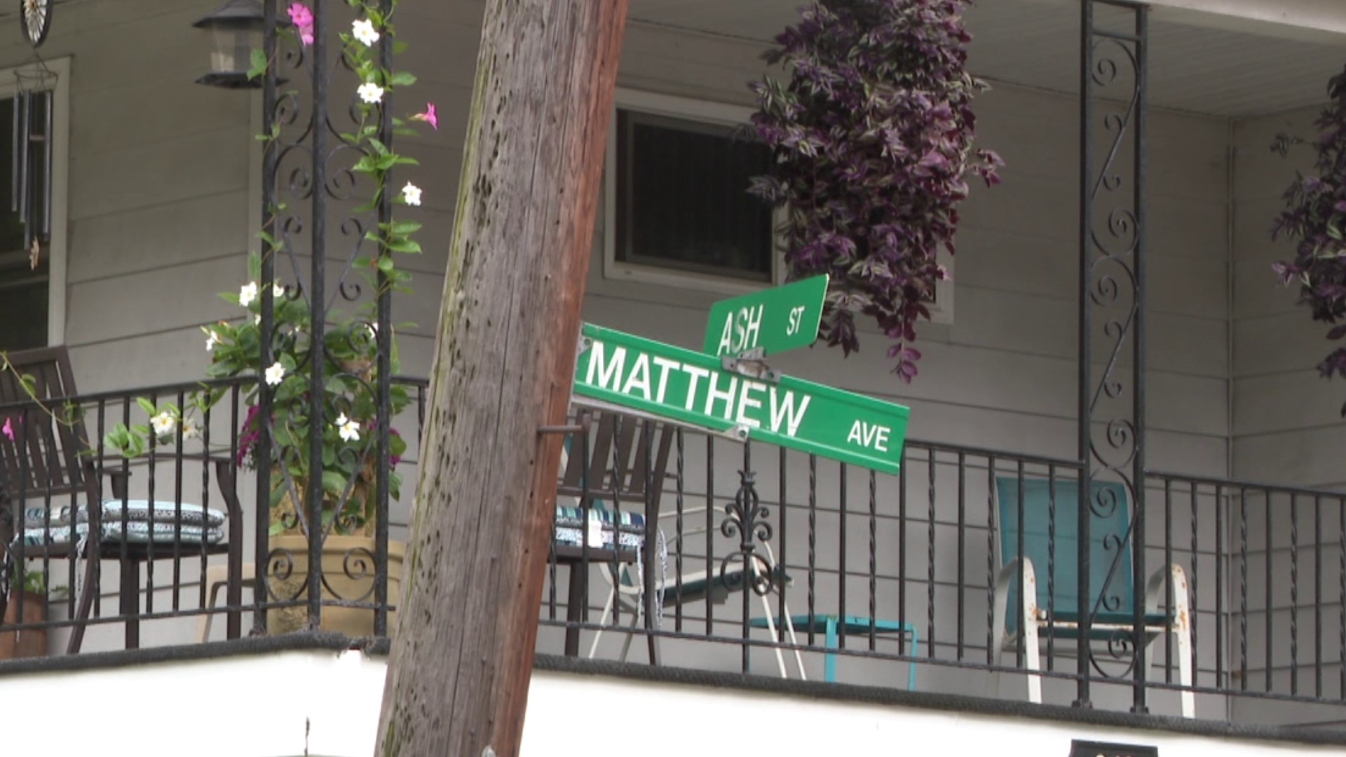Officials say two officers were taken to the hospital after falling more than 10 feet during an investigation along Matthew Avenue Saturday morning.
