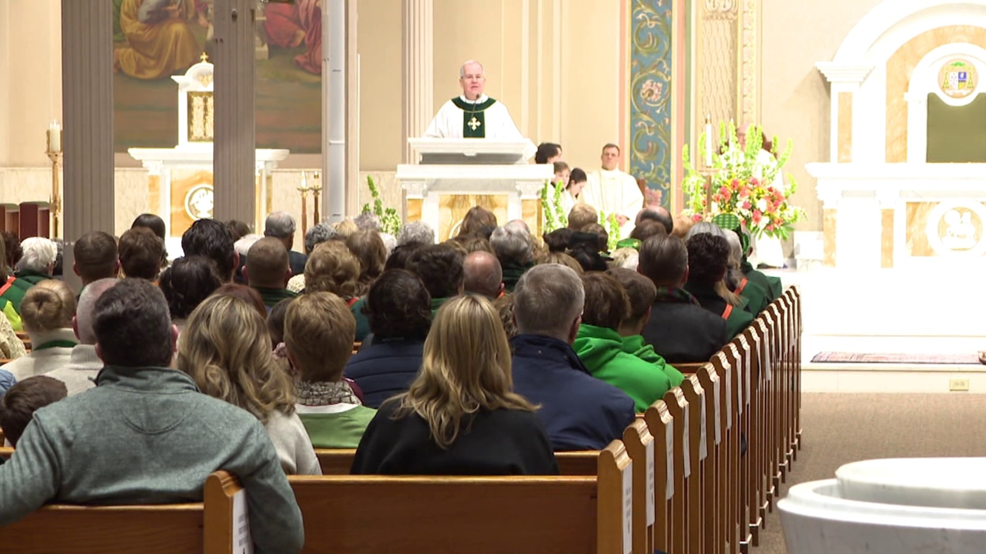 Paradegoers gathered for the annual mass at the Cathedral of St. Peter along Wyoming Avenue in the city Saturday morning.