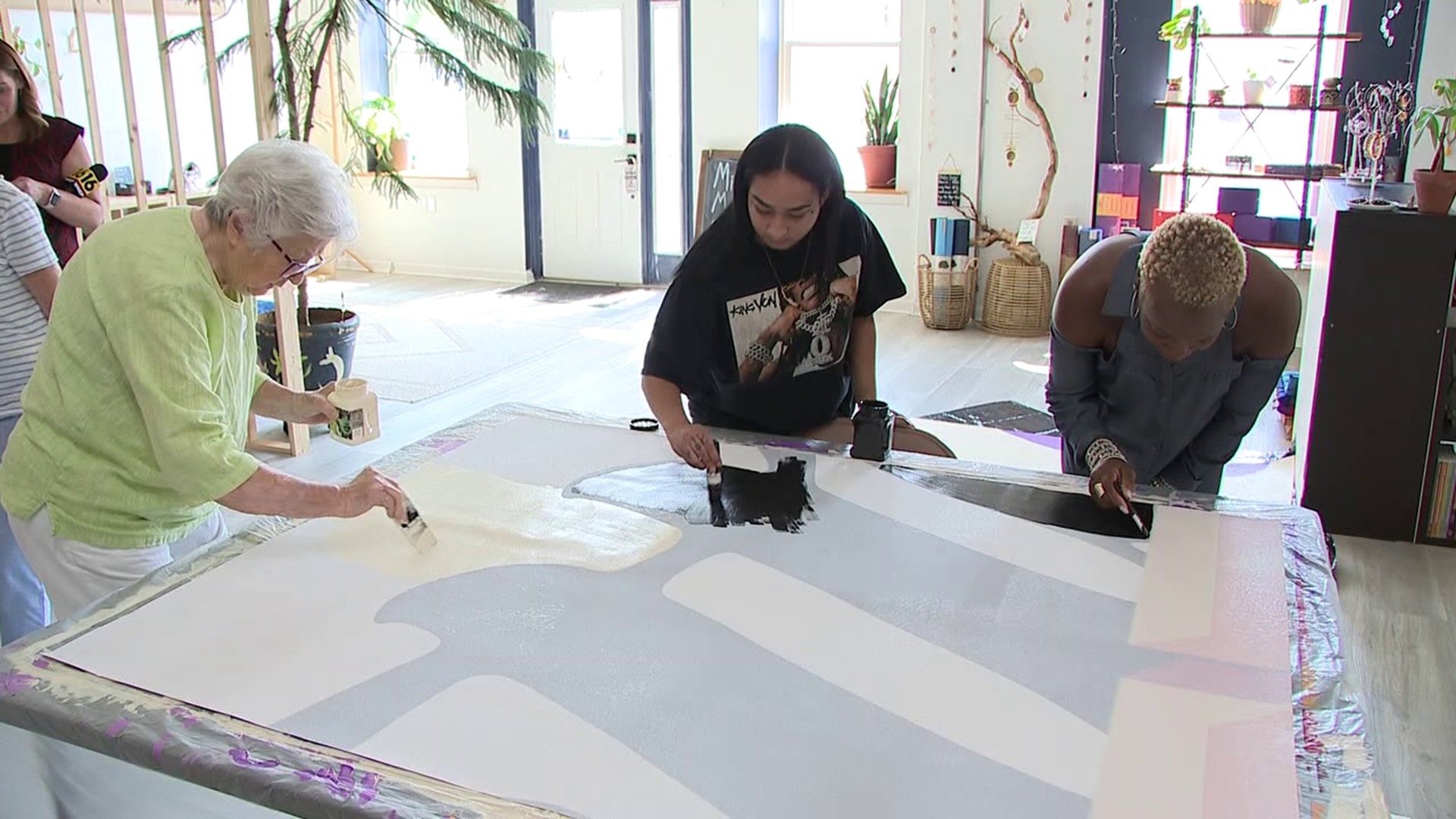 A community mural project is in the works in Milton with the theme, 'Better Together.' Newswatch 16's Nikki Krize stopped by to pick up a paintbrush.