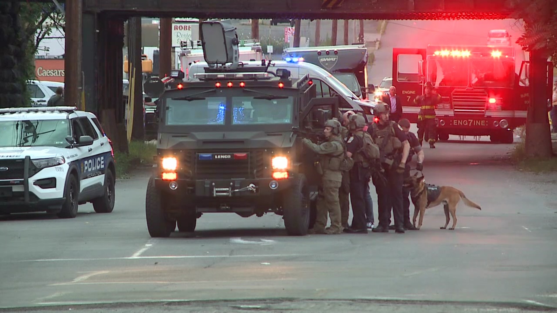 Officers, a SWAT team, and other emergency responders blocked off the area near a home on Luzerne Street.