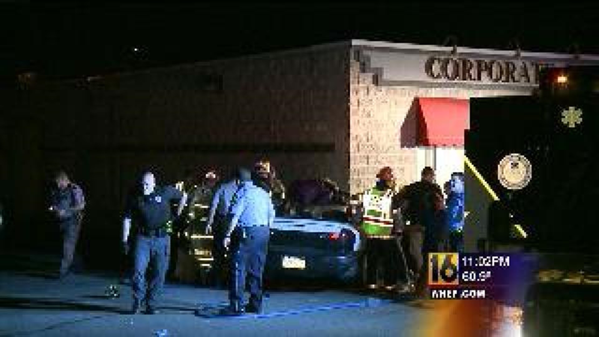 Car Slams Into Building Trapping Driver