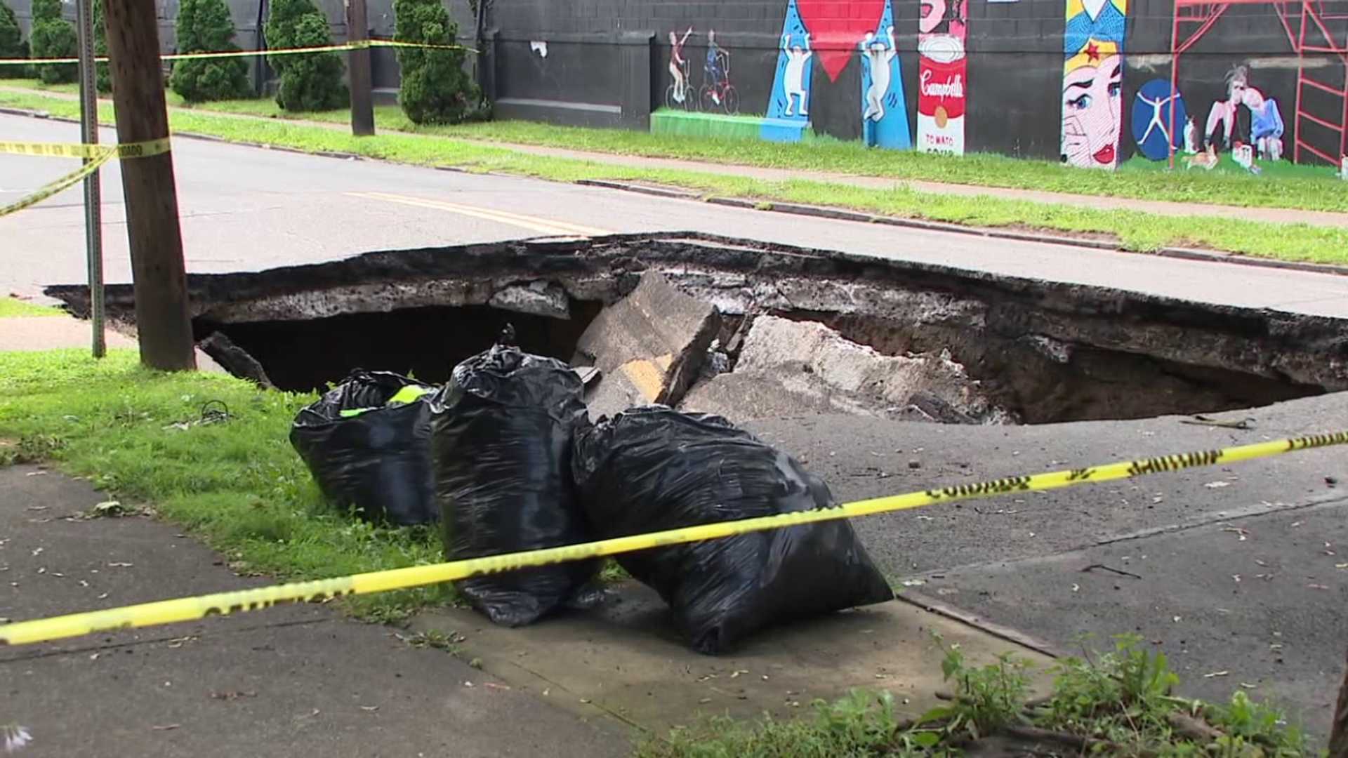 A massive hole along the 100 block of Horton Street has forced 12 people from their homes.