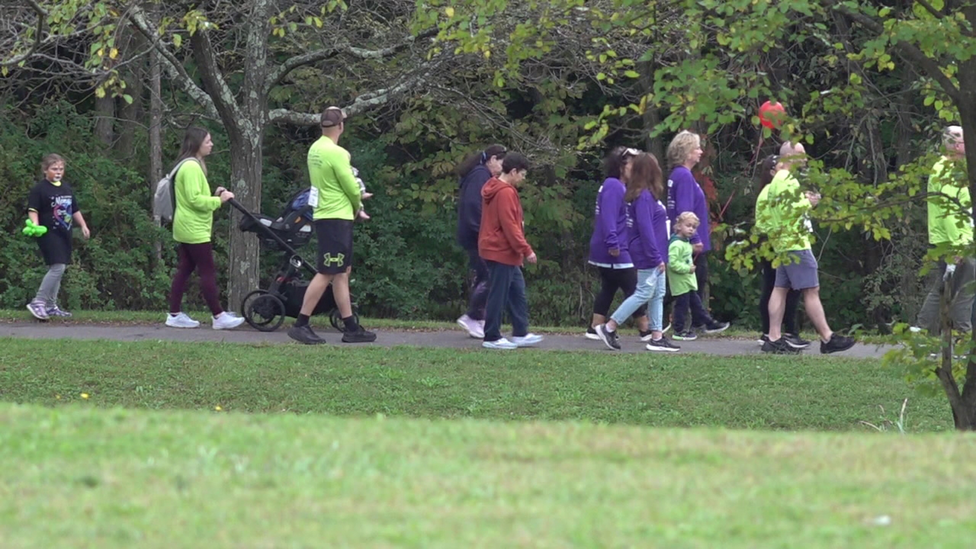 Hundreds took part in the one-mile walk around McDade Park Saturday to remember a loved one.