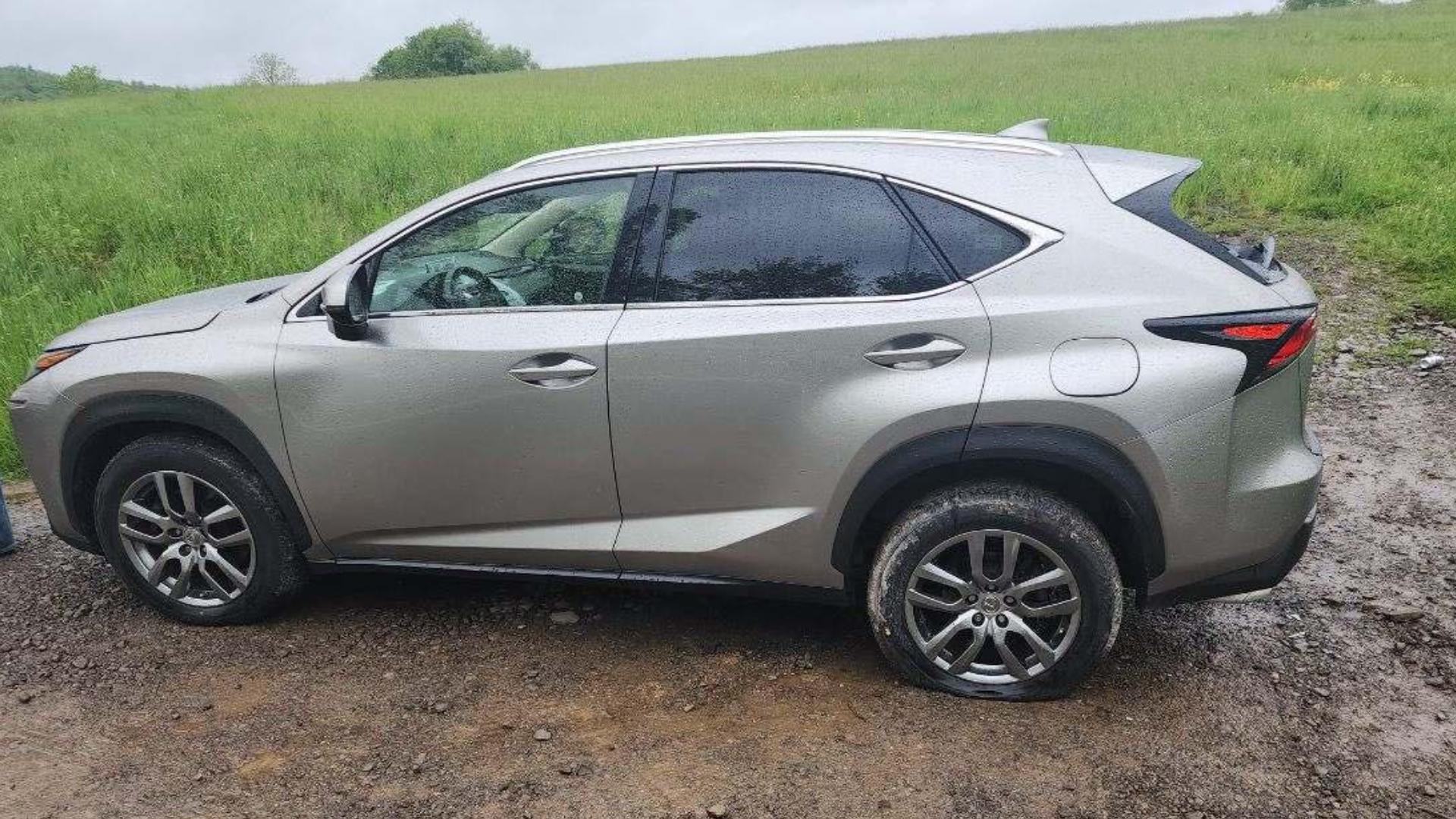 Police search for suspects after woman's car is vandalized in Wyoming