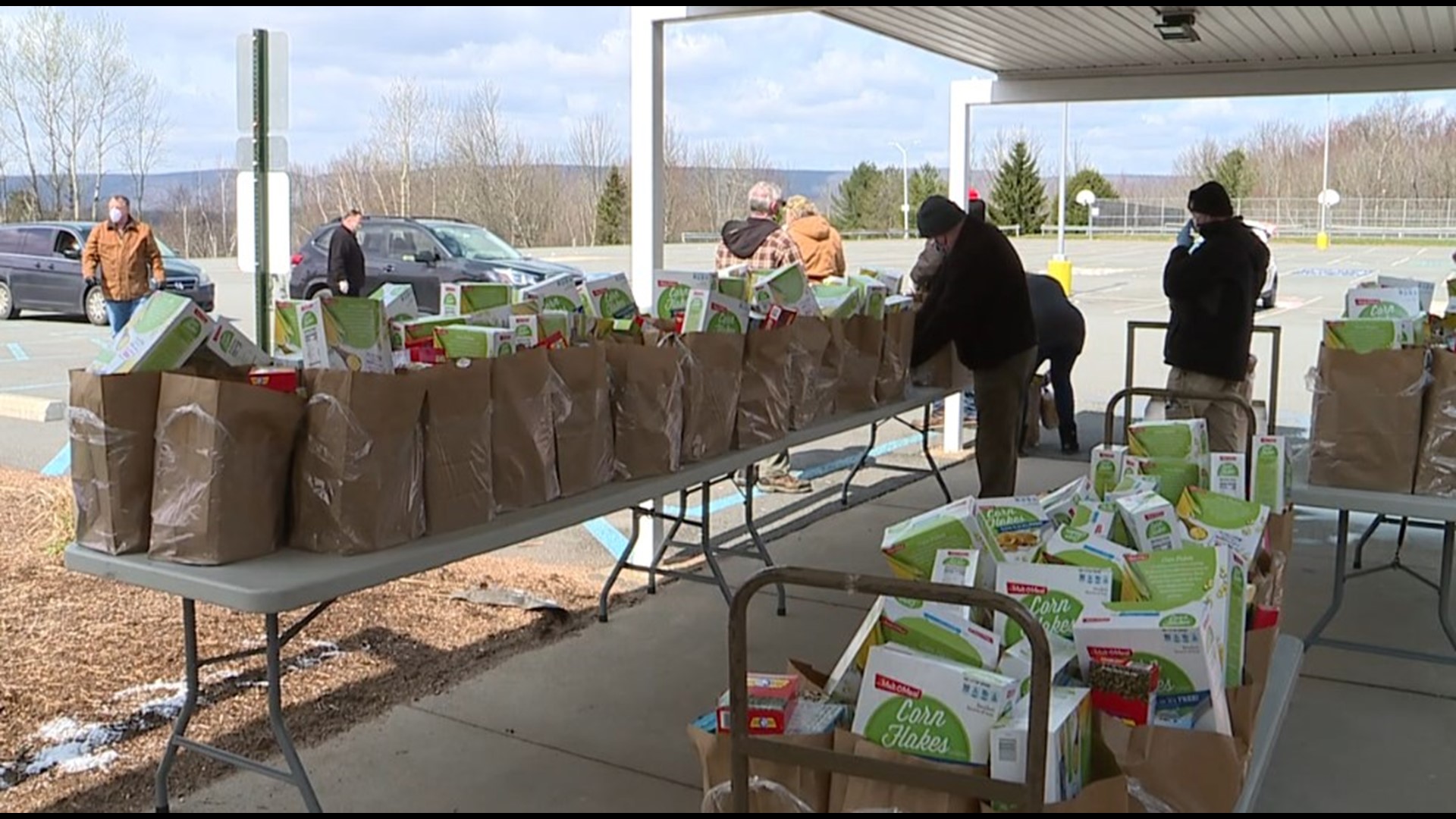 County Commissioners teamed up with local school districts to raise money and buy food for families.