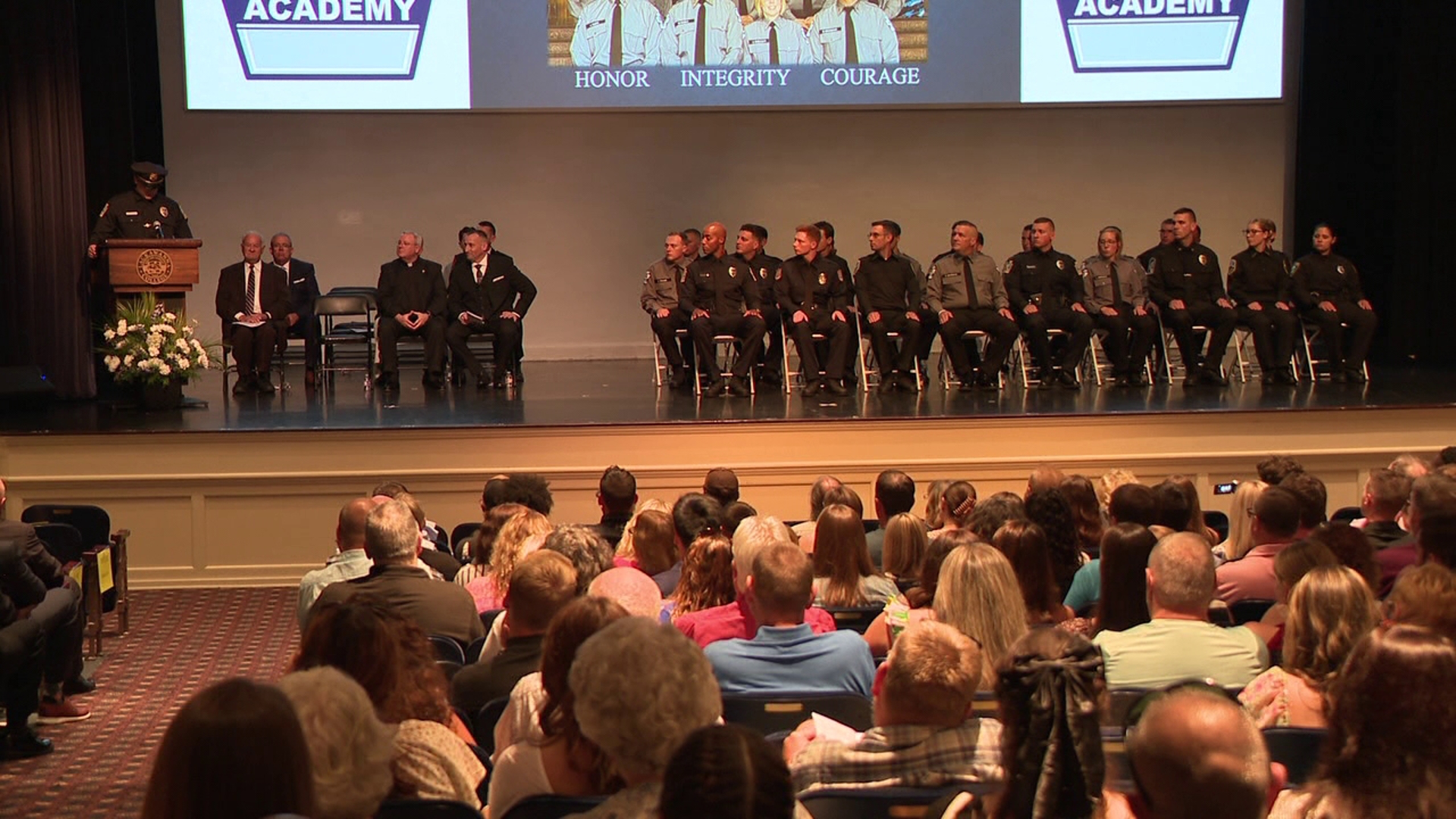 It was an emotional night for many parents, cadets, and guest speaker Detective Kyle Gilmartin as he addressed the more than two dozen new officers.